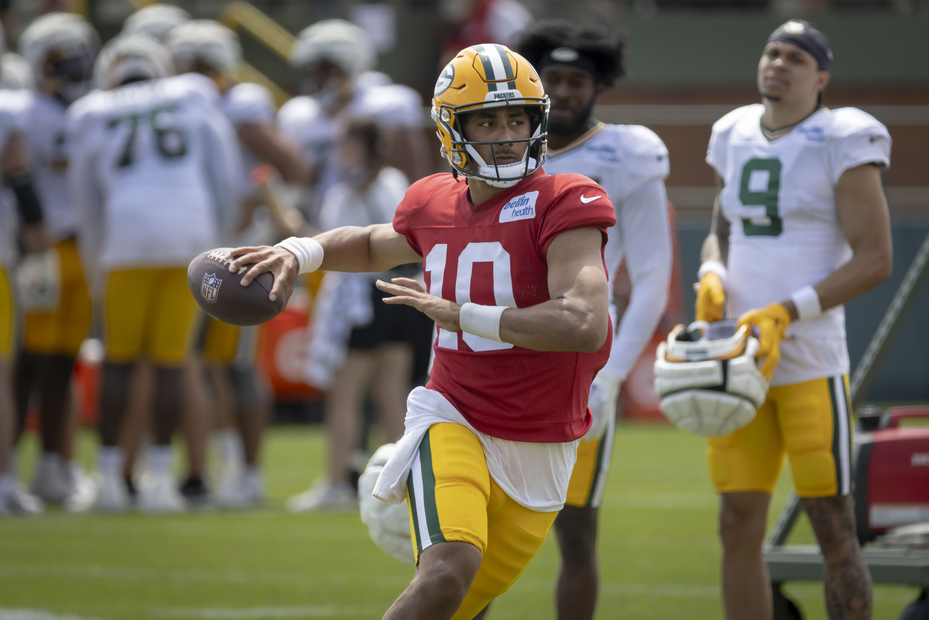 Green Bay Packers' Jordan Love (10) throws a pass during a drill during NFL football training camp.