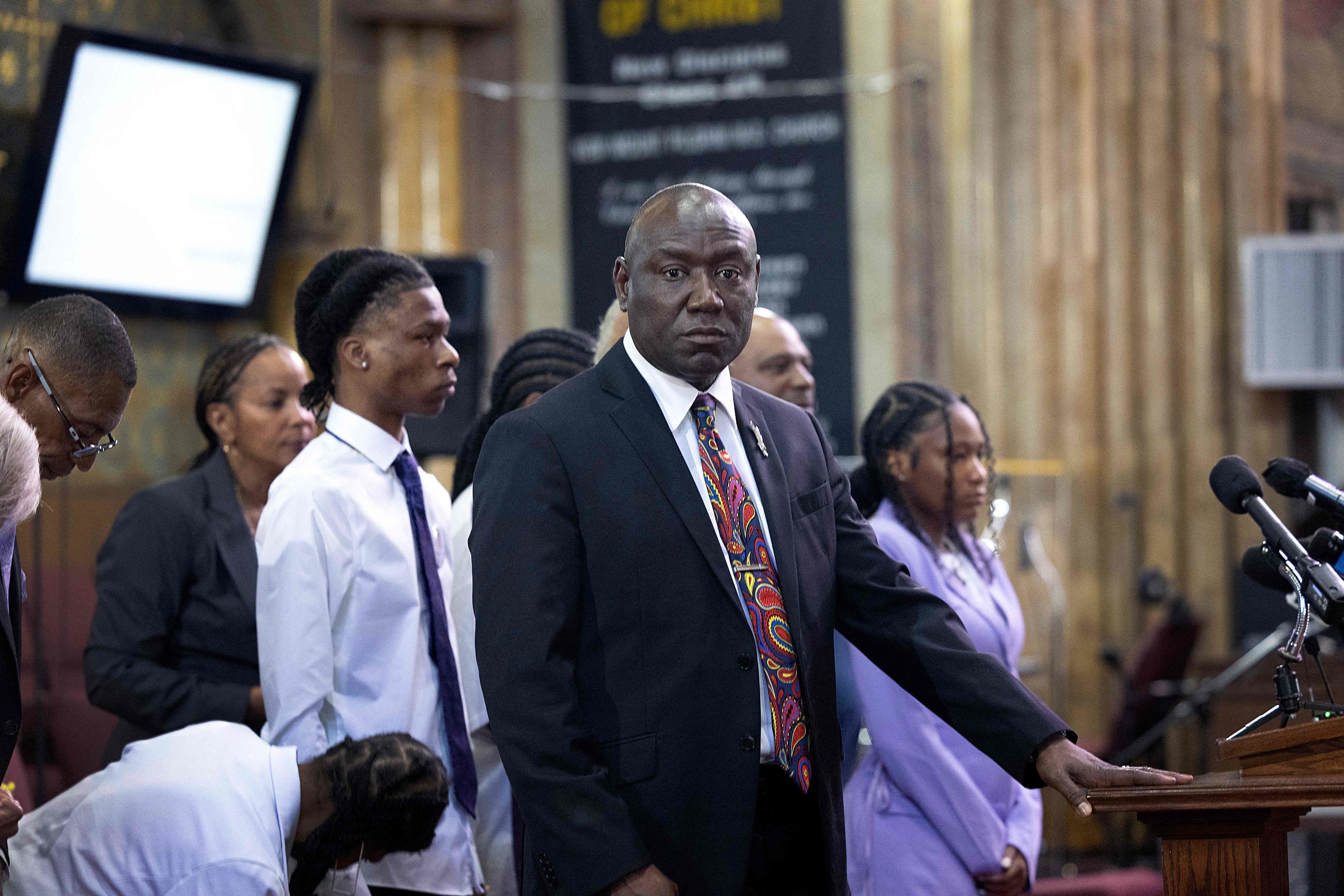 Attorney Ben Crump speaks alongside family members of Sonya Massey during a press conference.