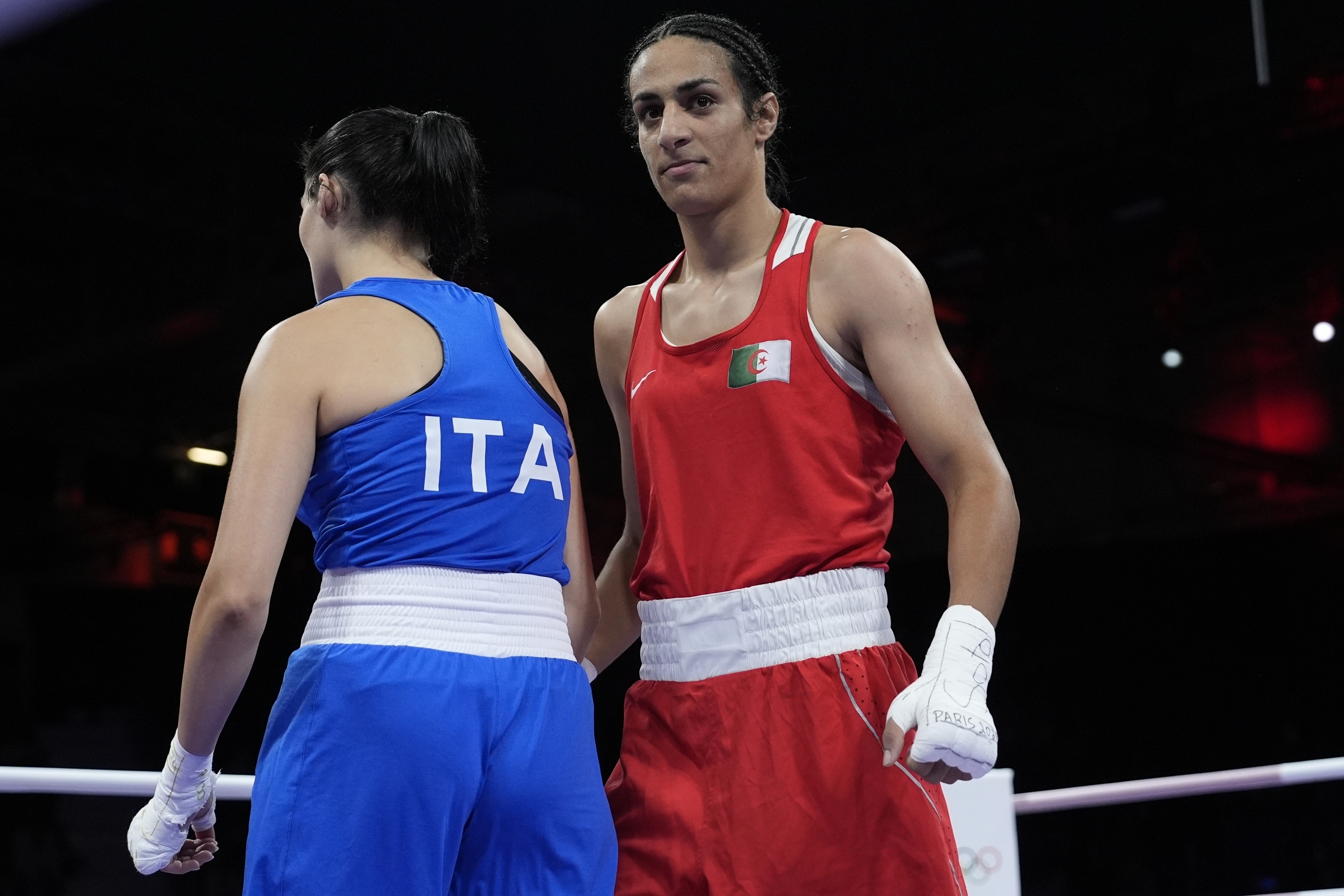 Algeria's Imane Khelif, right, after defeating Italy's Angela Carini, left, in their women's 66kg.