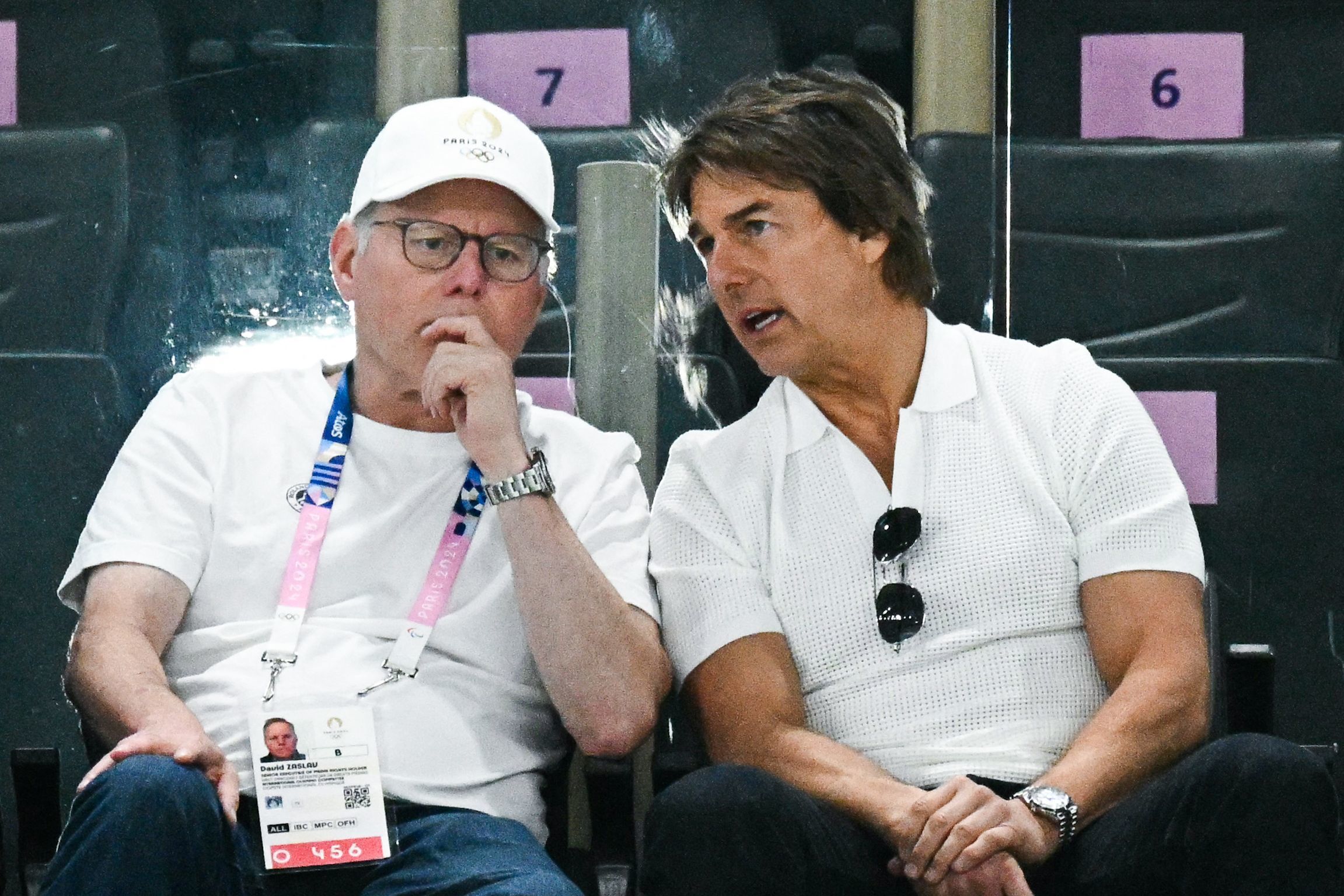 US actor Tom Cruise (R) speaks with Warner Bros CEO David Zaslav (L)