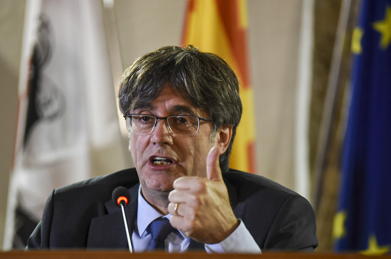 Catalan leader Carles Puigdemont speaks at a press conference in Alghero.