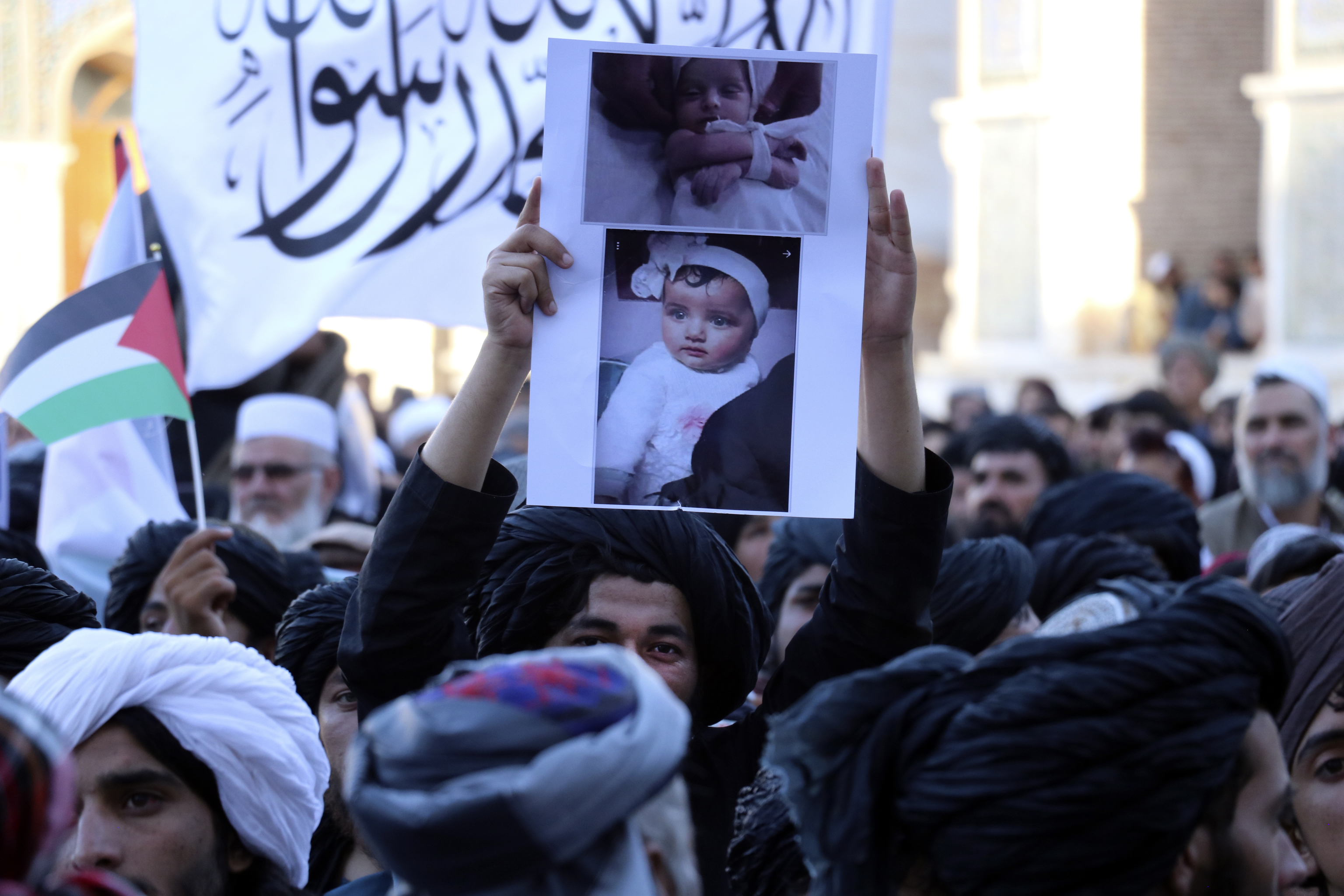 Afghan people attend a demonstration to condemn the killing of Hamas leader Ismail Haniyeh