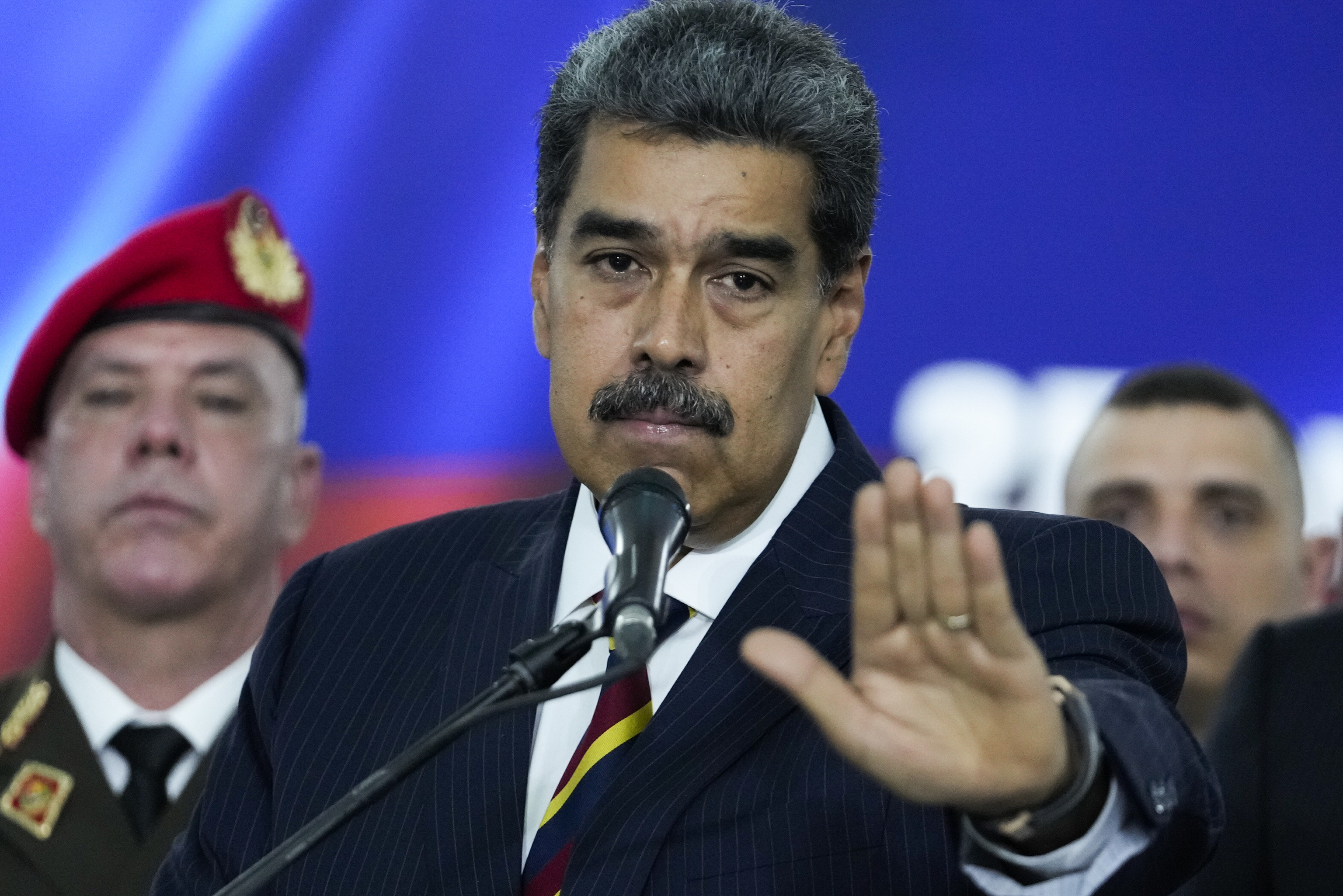 Venezuelan President Nicolas Maduro speaks to the press.