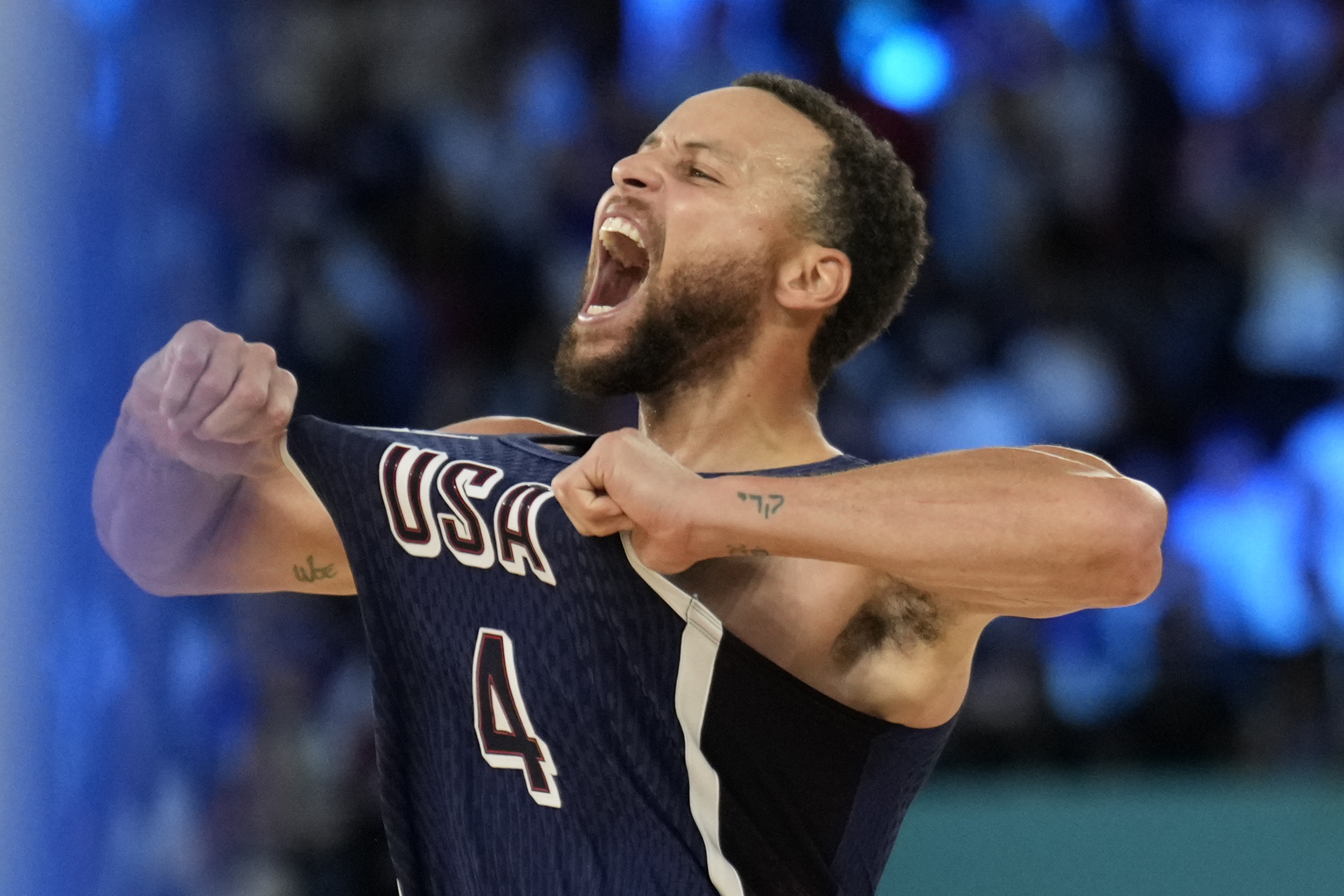 United States' Stephen Curry celebrates after the United States won a men's gold medal basketball.