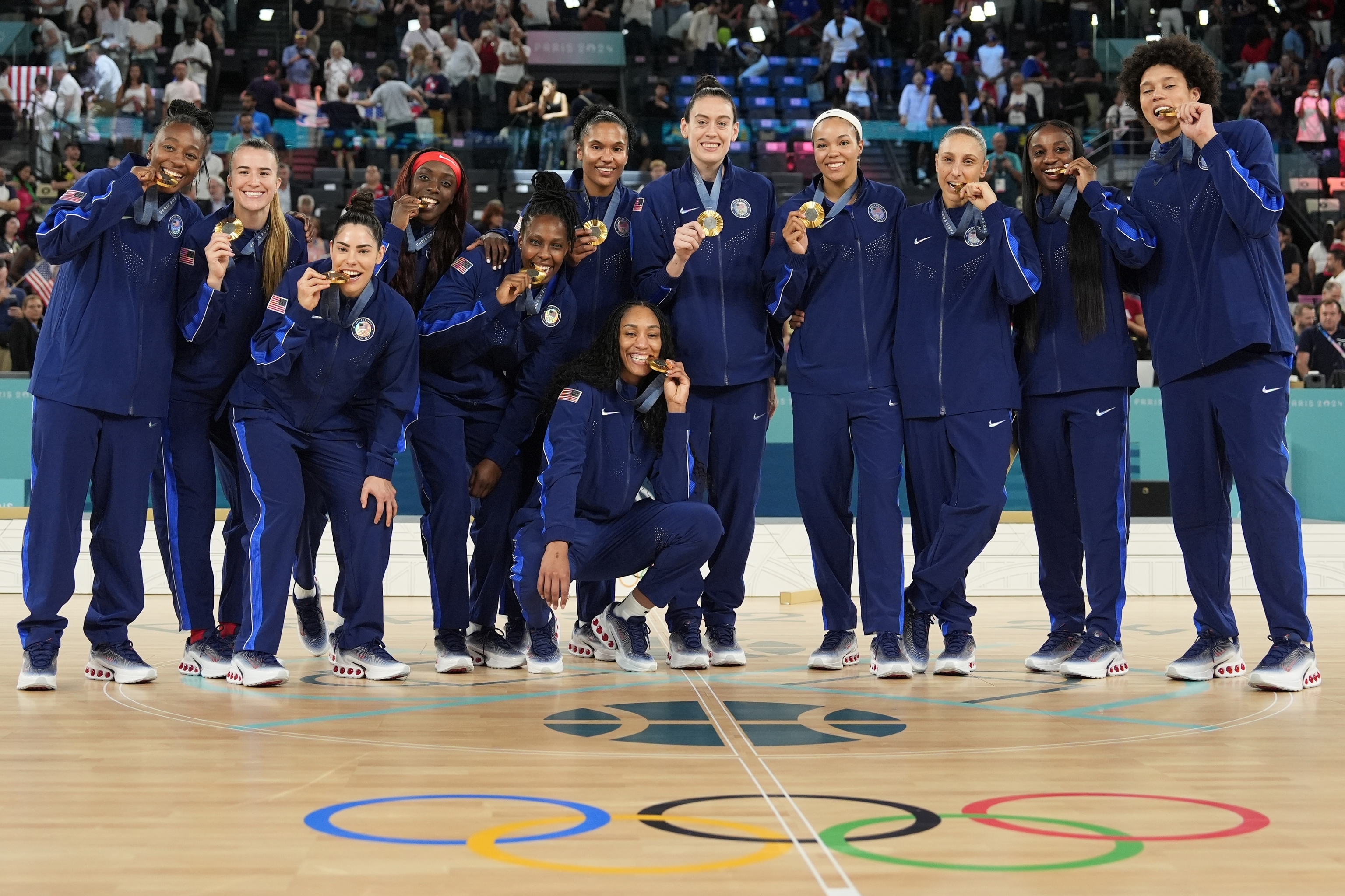 The United States team poses for a picture with their gold medals.