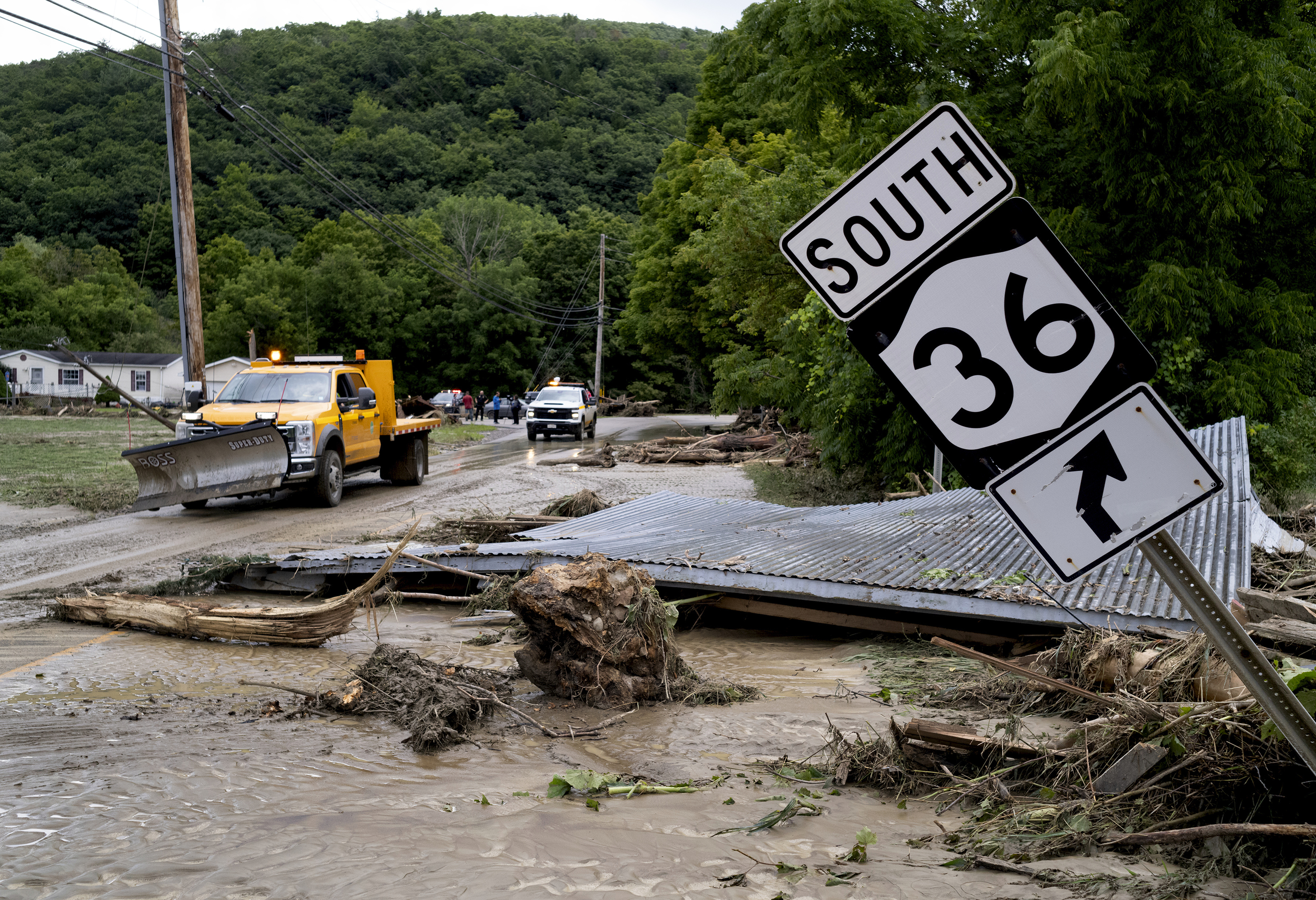 Debris from a building is seen along Route 36 in Canisteo