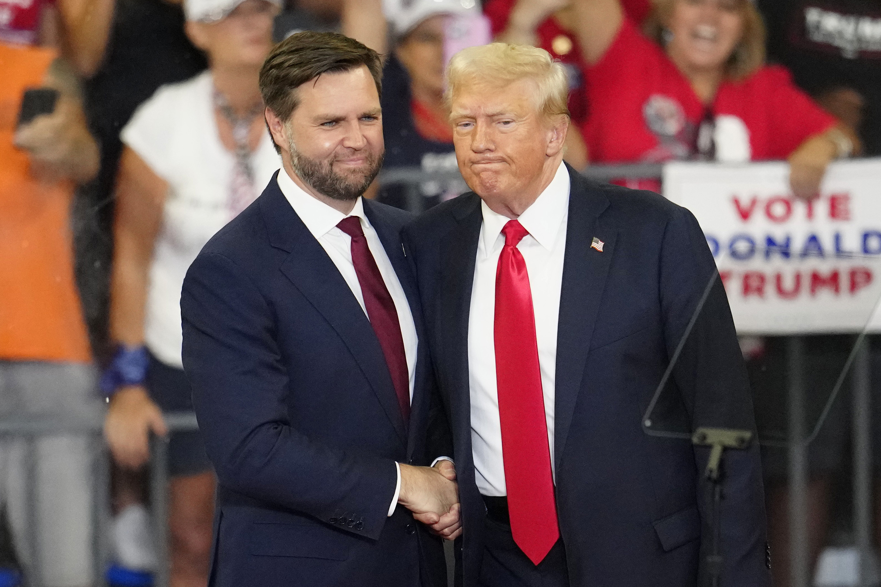 Republican vice presidential candidate Sen. JD Vance, R-Ohio, left, and Republican presidential candidate former President Donald Trump.