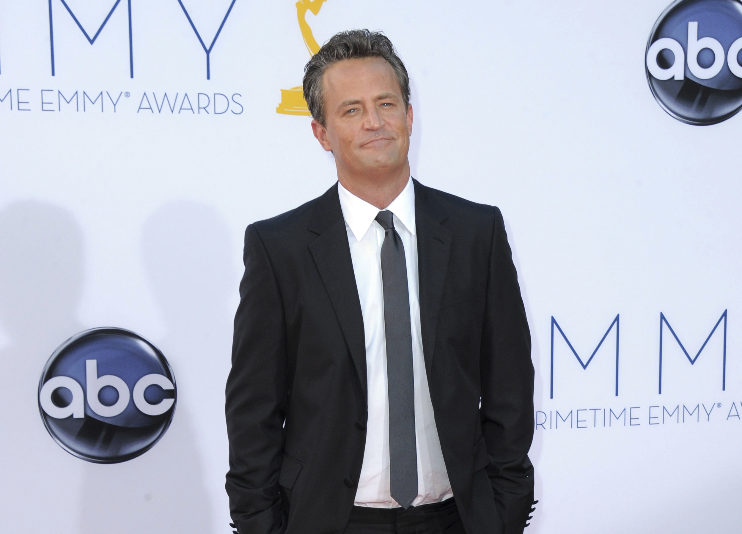 Actor Matthew Perry arrives at the 64th Primetime Emmy Awards