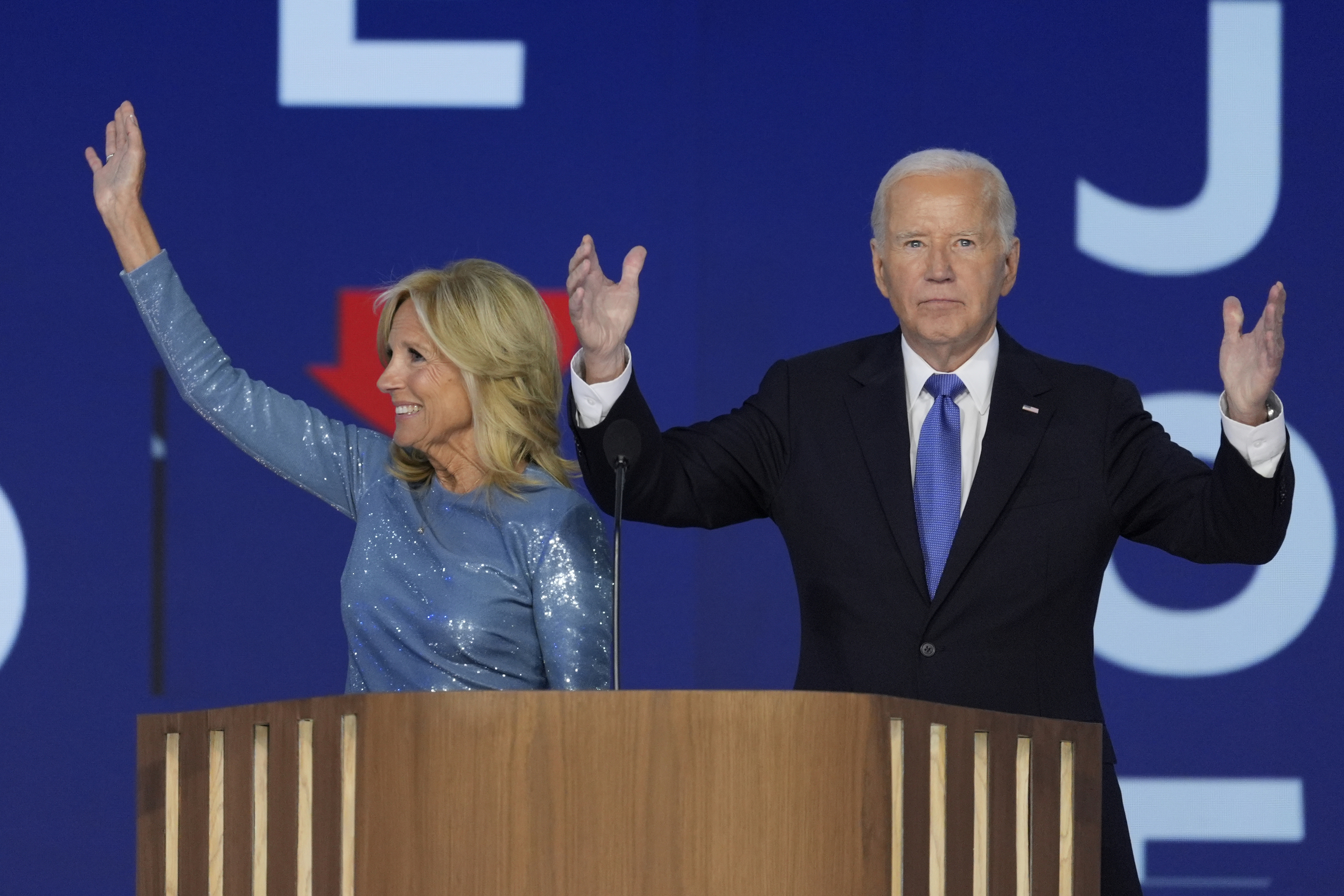 President Joe Biden, right, and first lady Jill Biden, left, on stage after President spoke at the Democratic National Convention