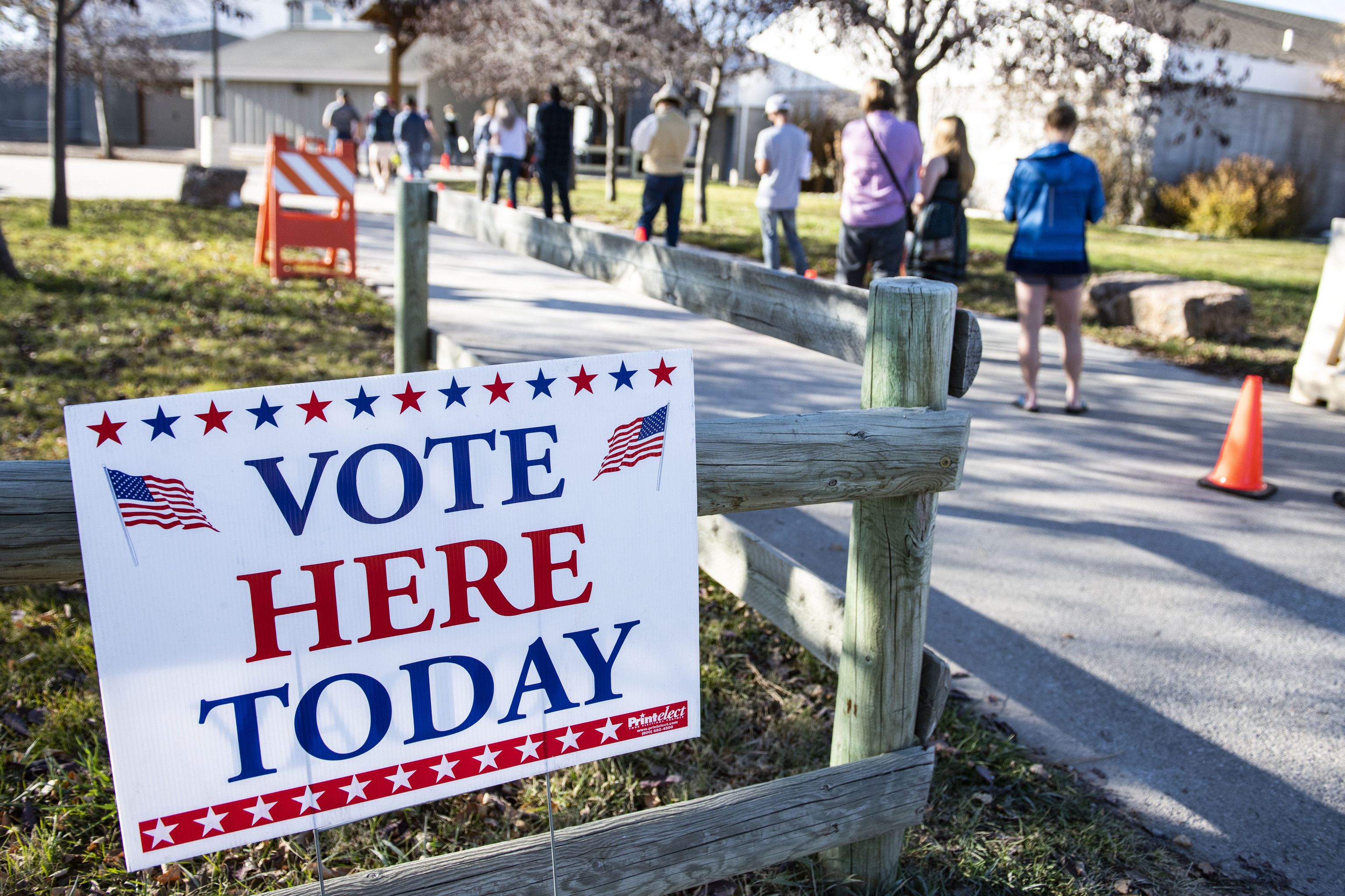 Patrons of the Gallatin County Fairgrounds wait in line to cast their ballots in Bozeman