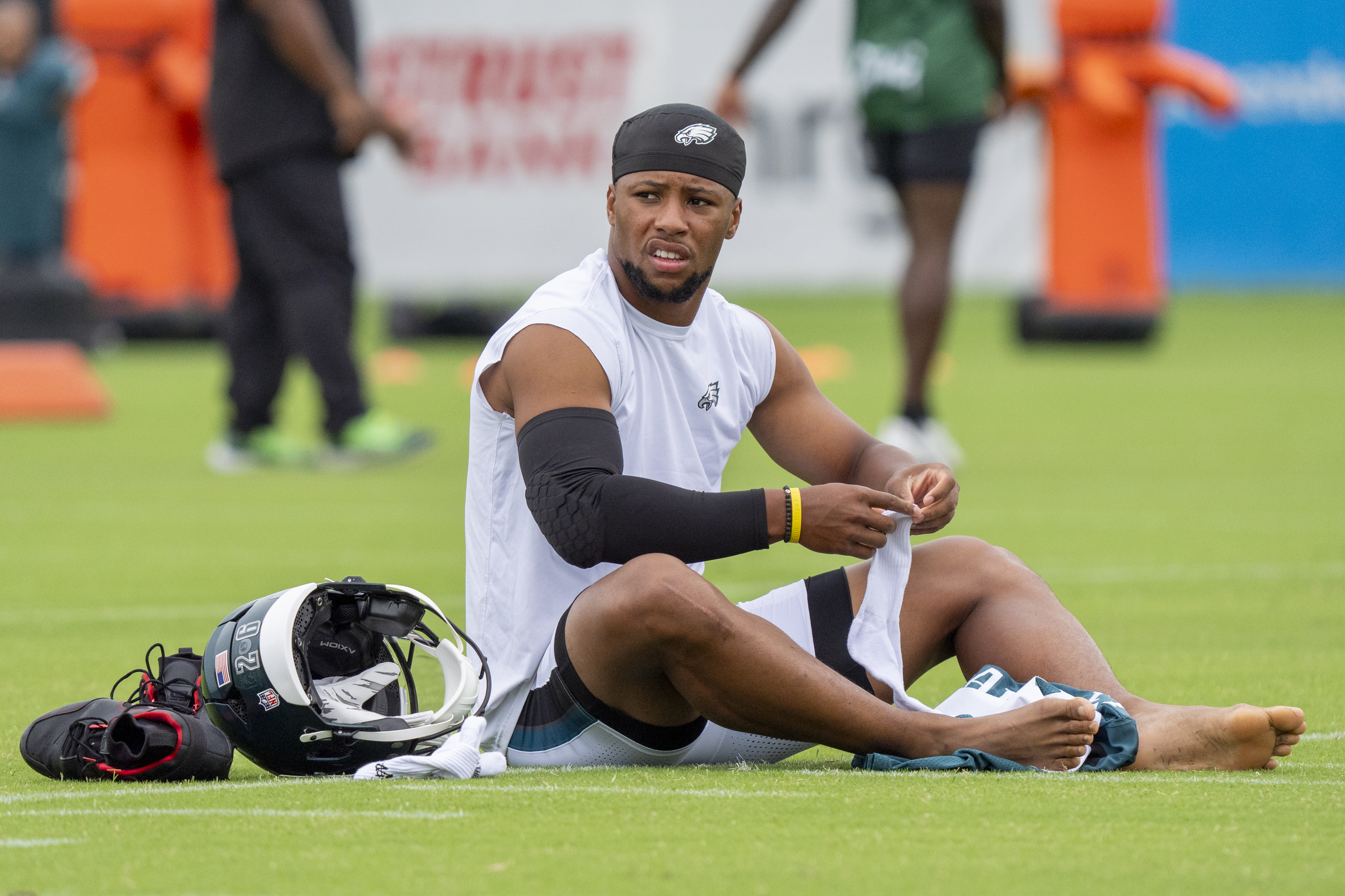 Philadelphia Eagles running back Saquon Barkley gets ready during practice at NFL football training camp