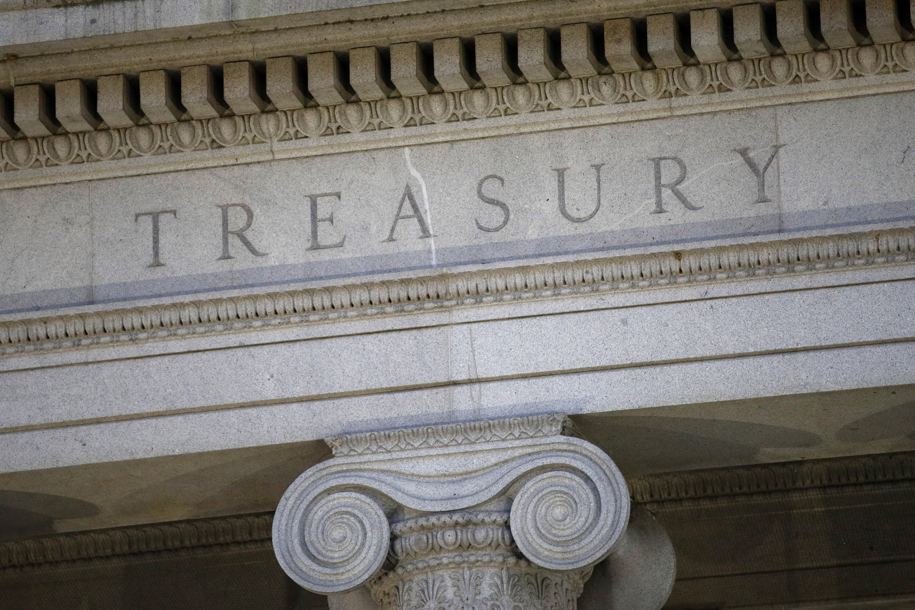 U.S. Treasury Department building at dusk in Washington