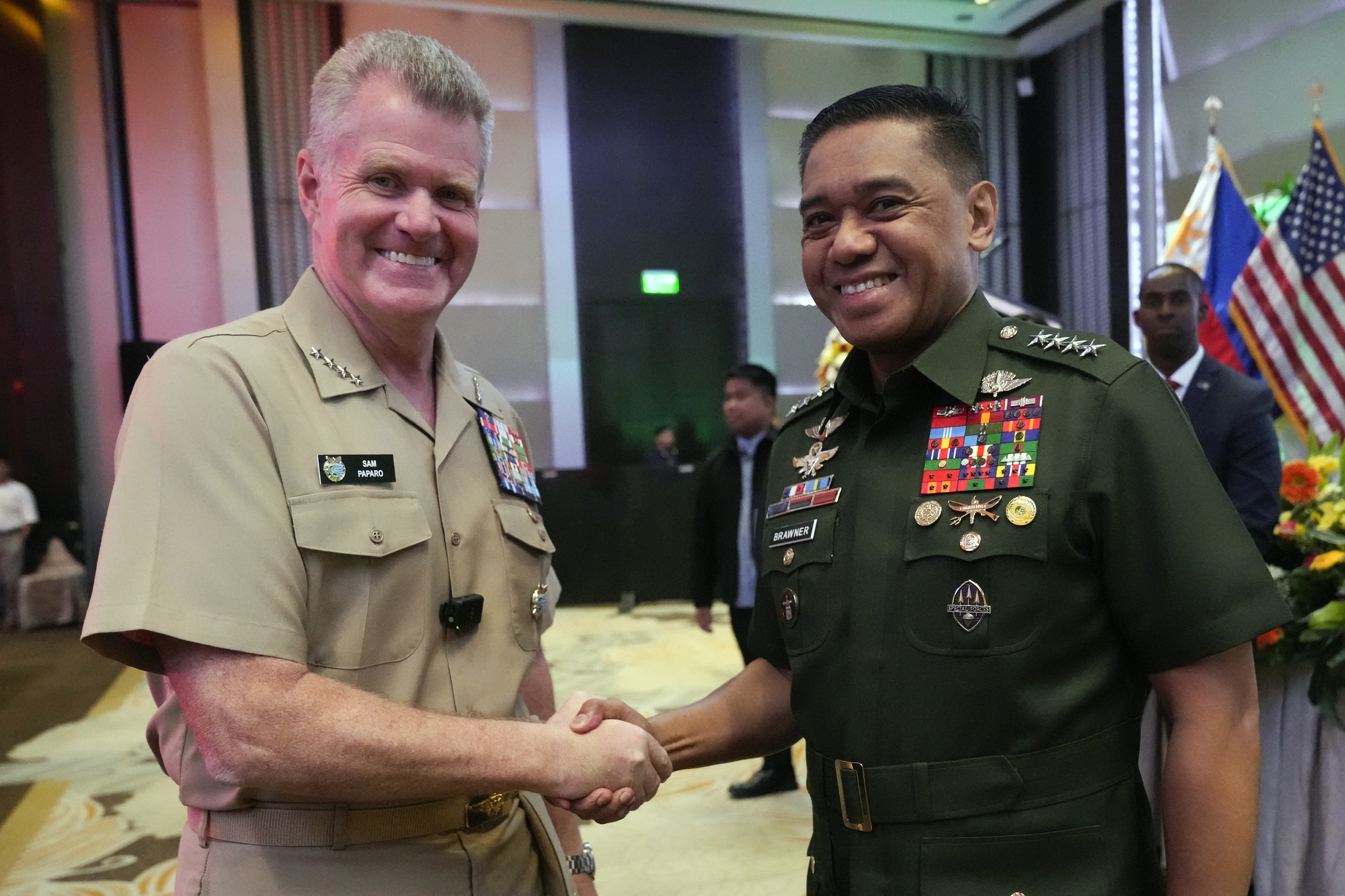 U.S. Indo-Pacific Command Commander Admiral Samuel Paparo, left, and Philippines military chief Gen. Romeo Brawner Jr.