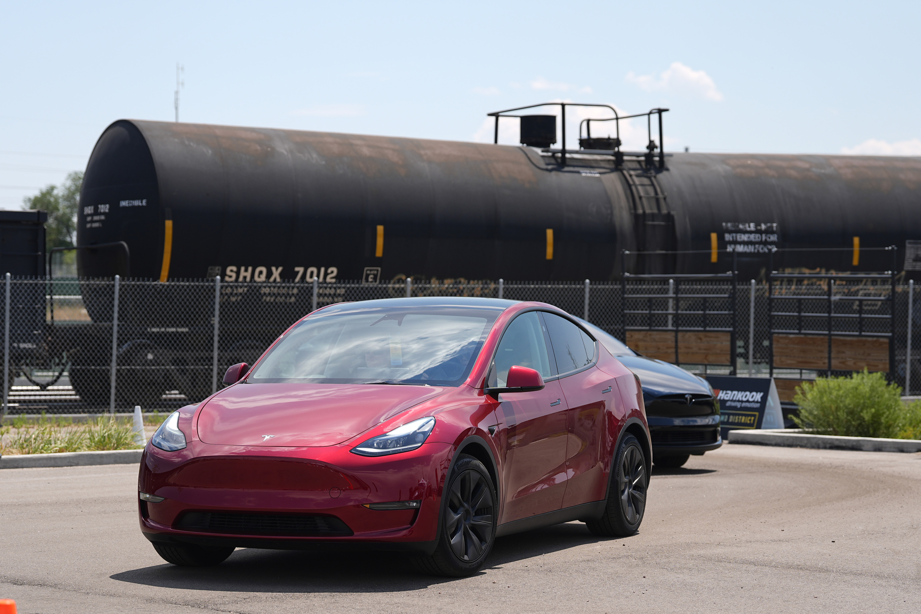 Drivers guide 2024 a Tesla Model 3 sedan and Model X utility vehicle