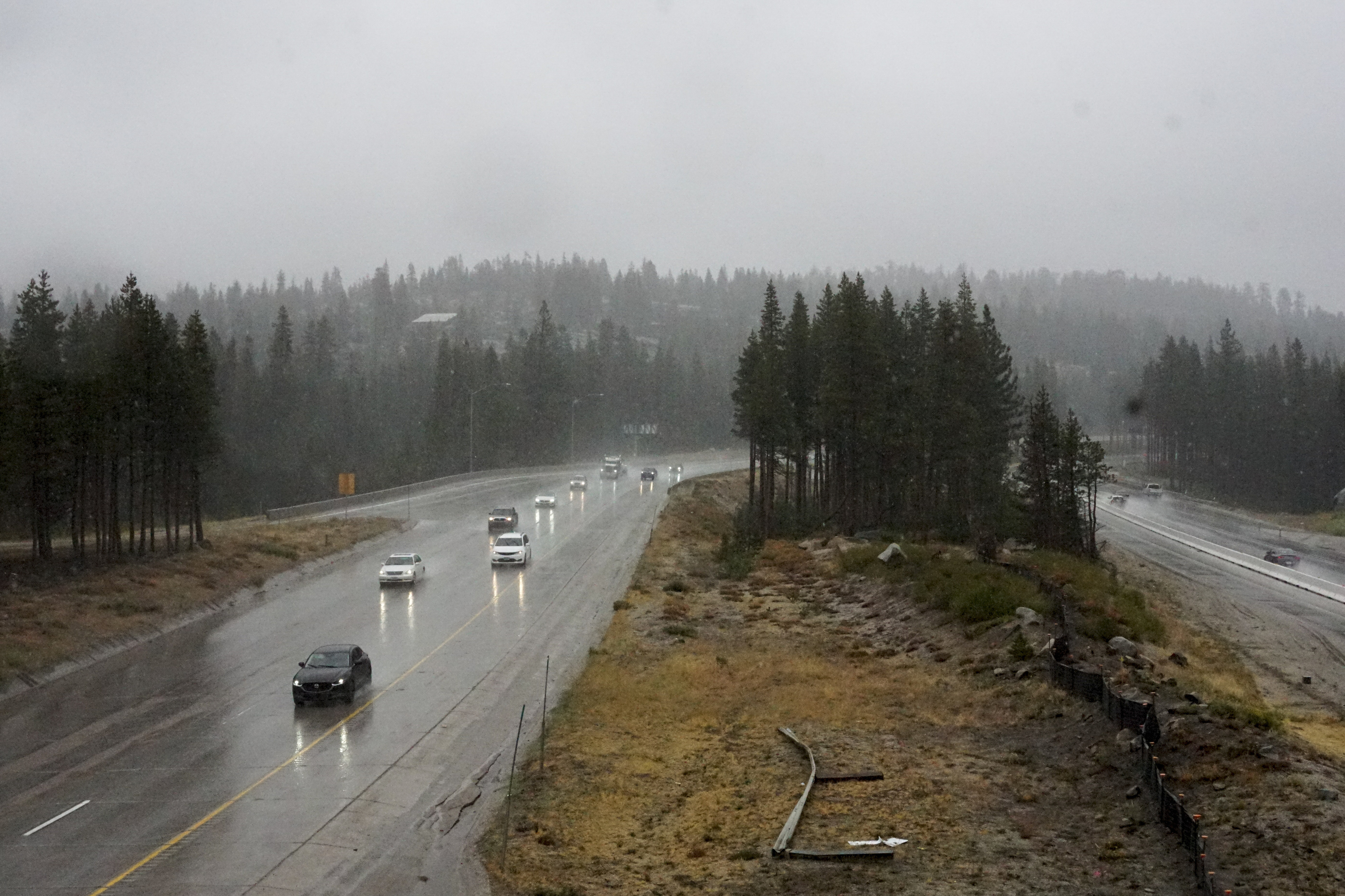 Motorists make their way along a rain-soaked Interstate 80 Saturday