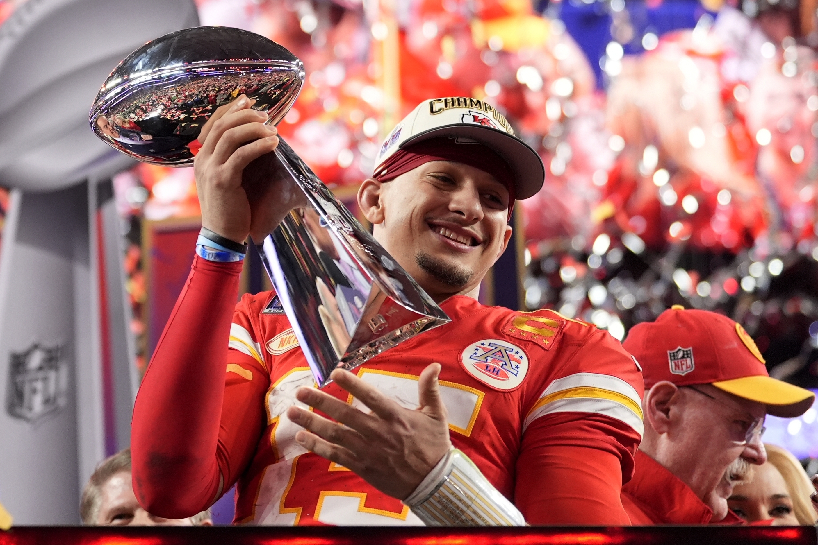 Kansas City Chiefs quarterback Patrick Mahomes celebrates with the trophy