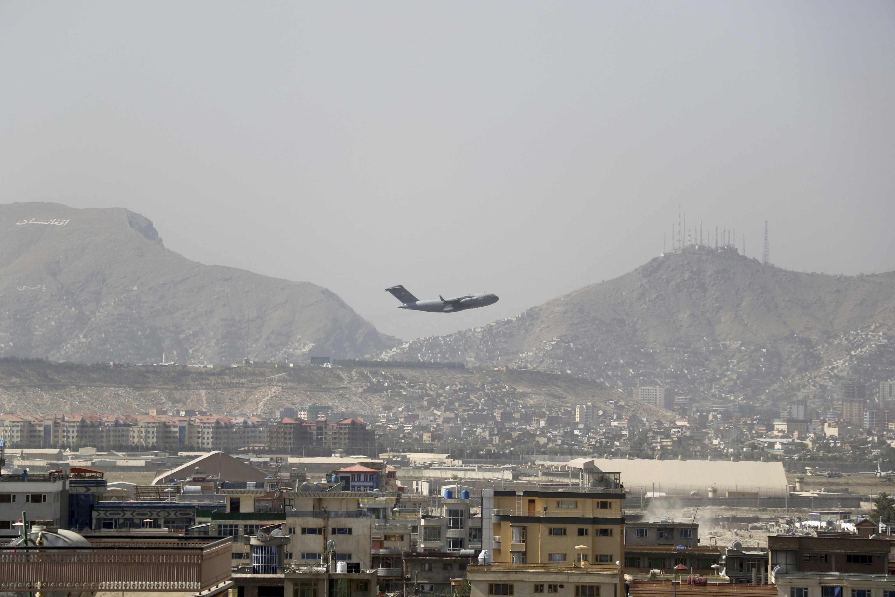 U.S military aircraft takes off at the Hamid Karzai International Airport in Kabul