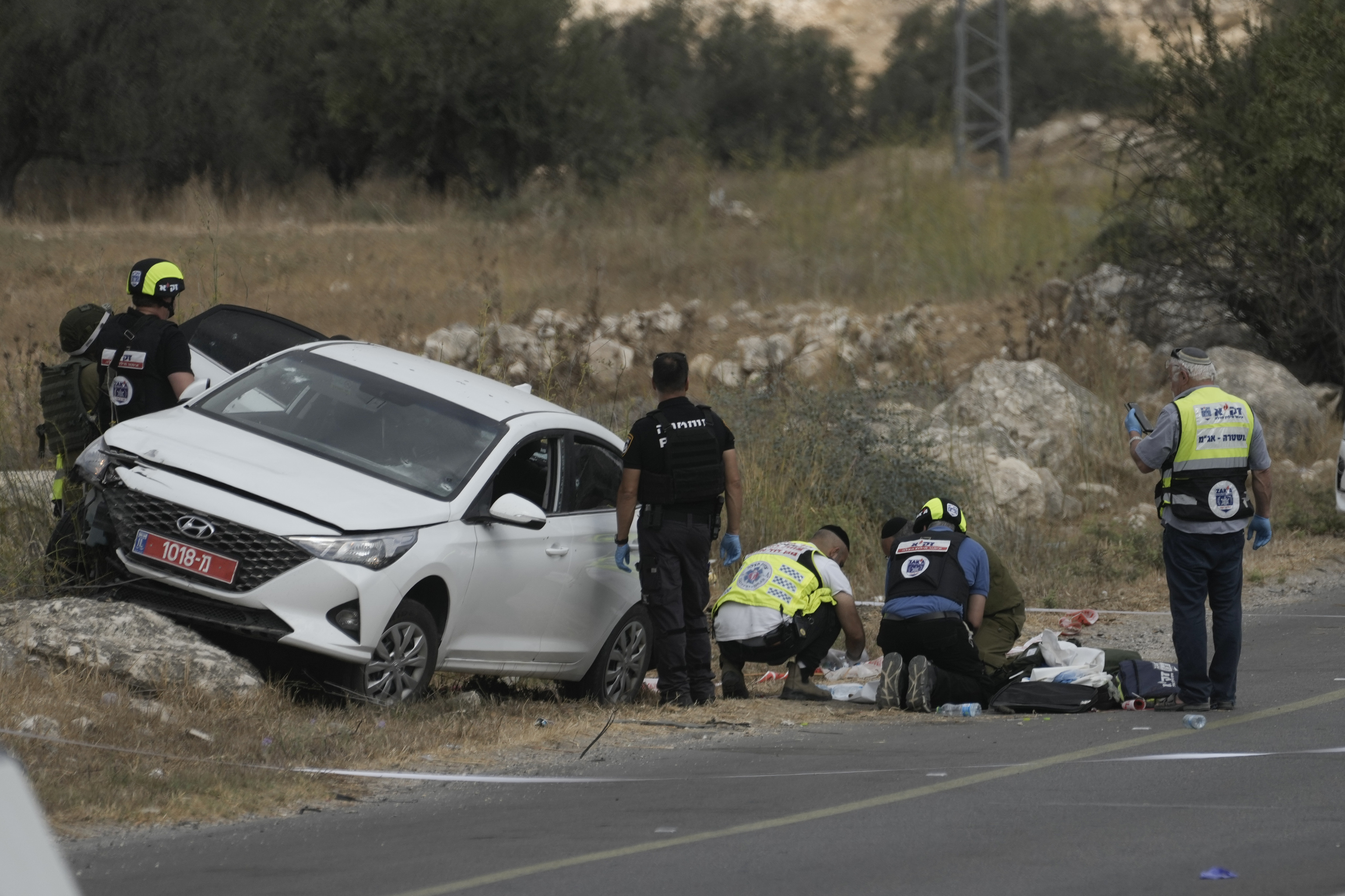 Israeli authorities said Palestinian gunmen killed a few Israelis in a shooting attack