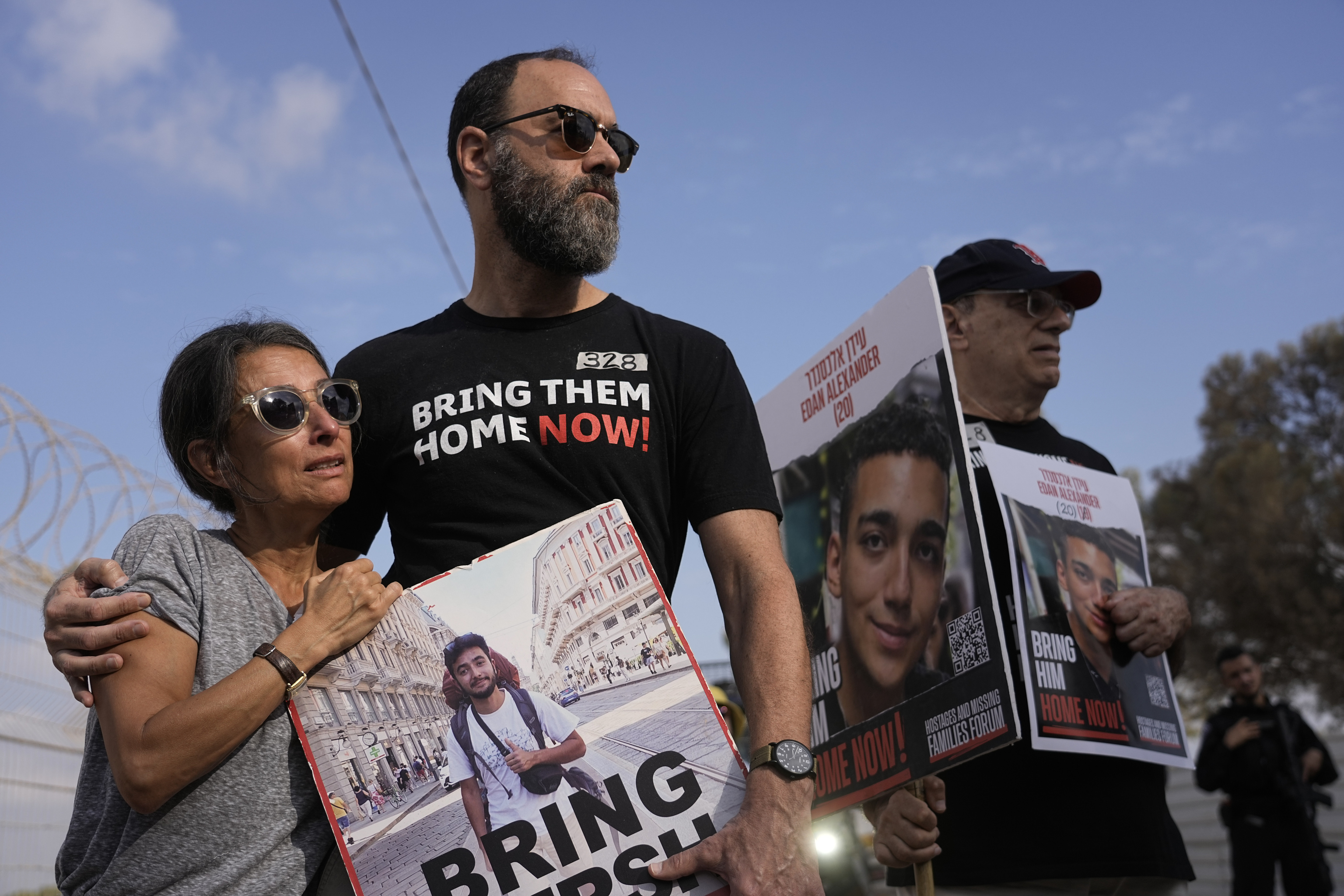 Rachel Goldberg, left, and Jon Polin center, parents of Israeli-American hostage Hersh Goldberg-Polin