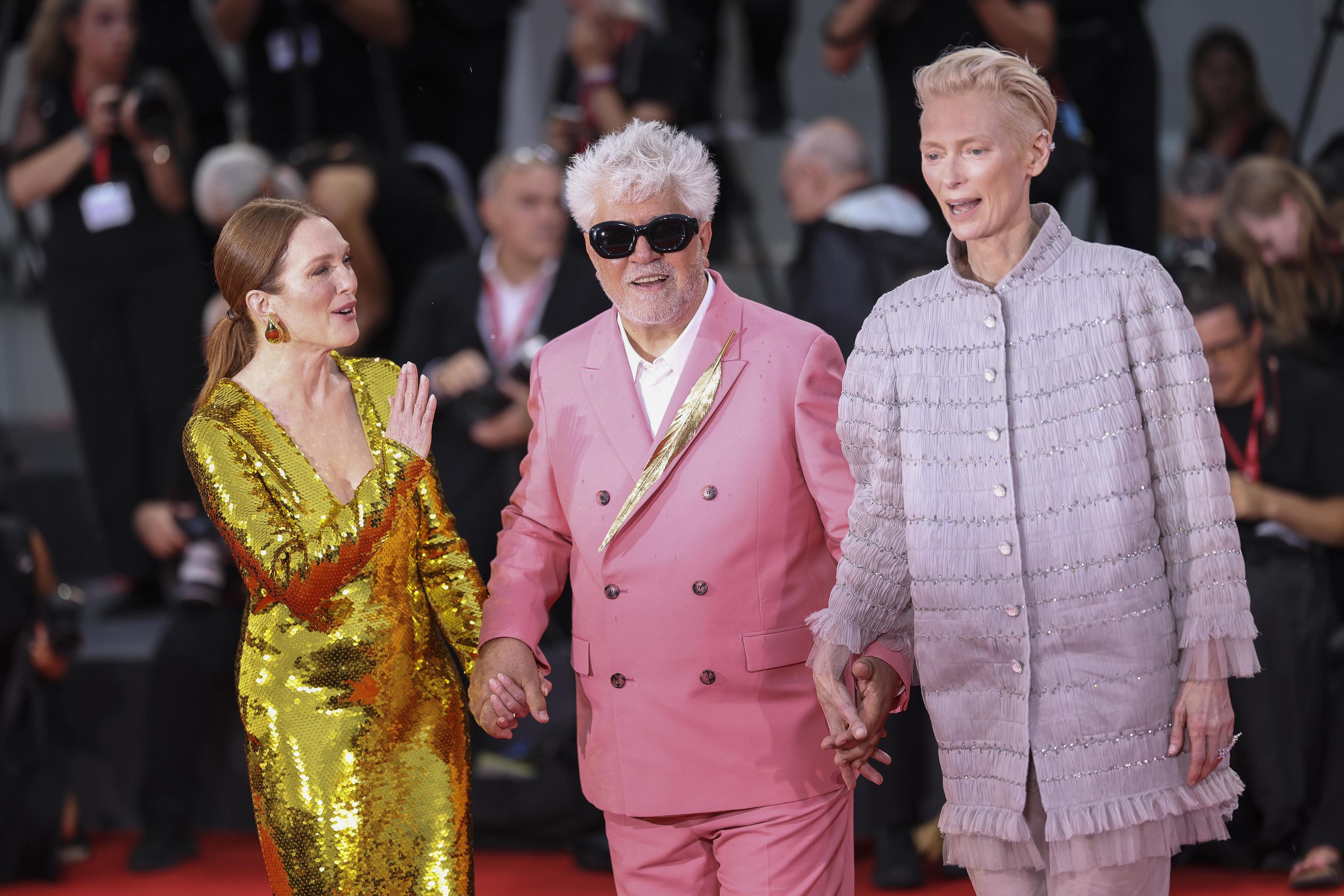 Julianne Moore, Almodvar and Tilda Swinton pose for the premiere.