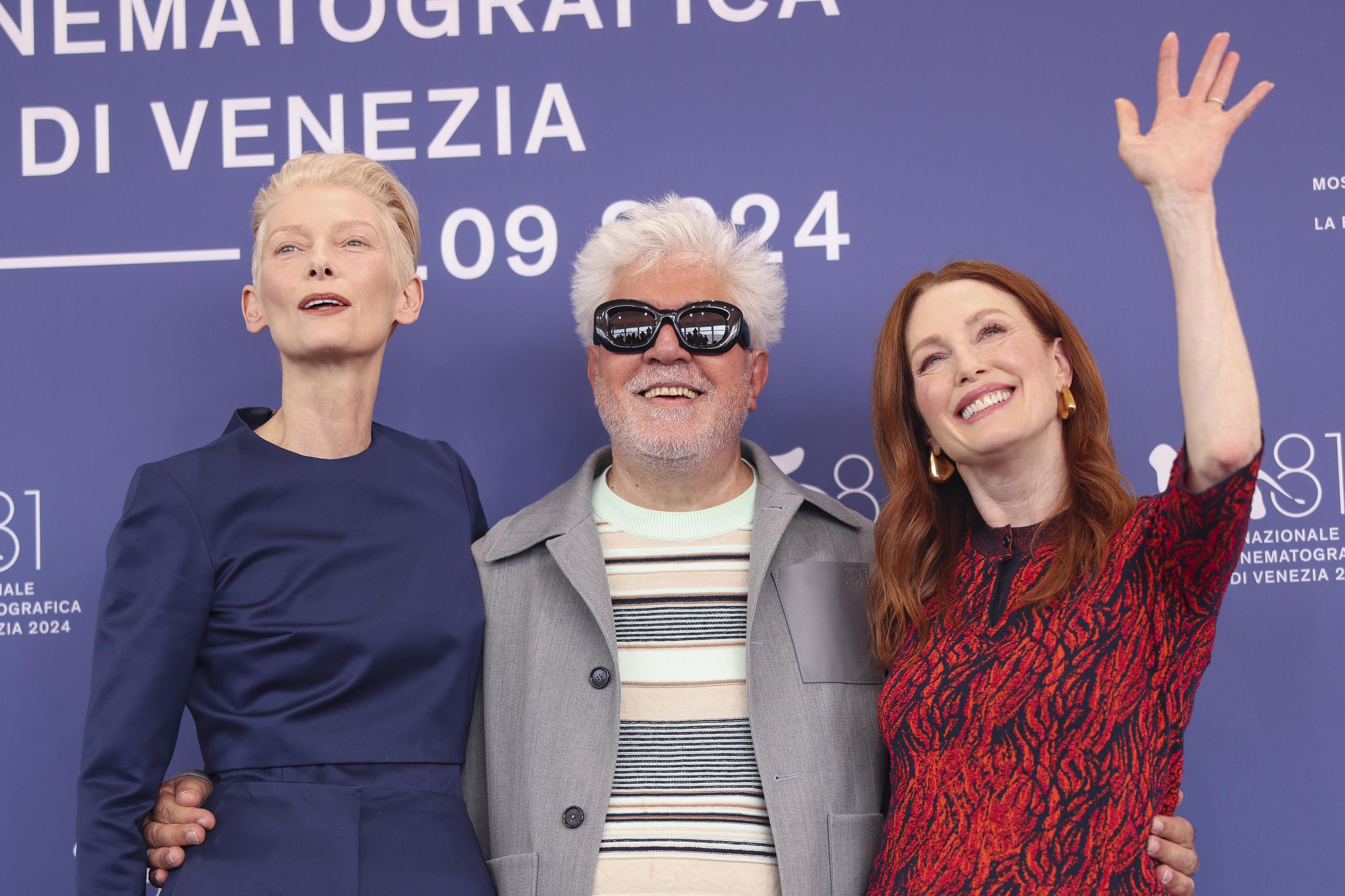 T. Swinton, Almodvar and J. Moore during the Venice Film Festival.