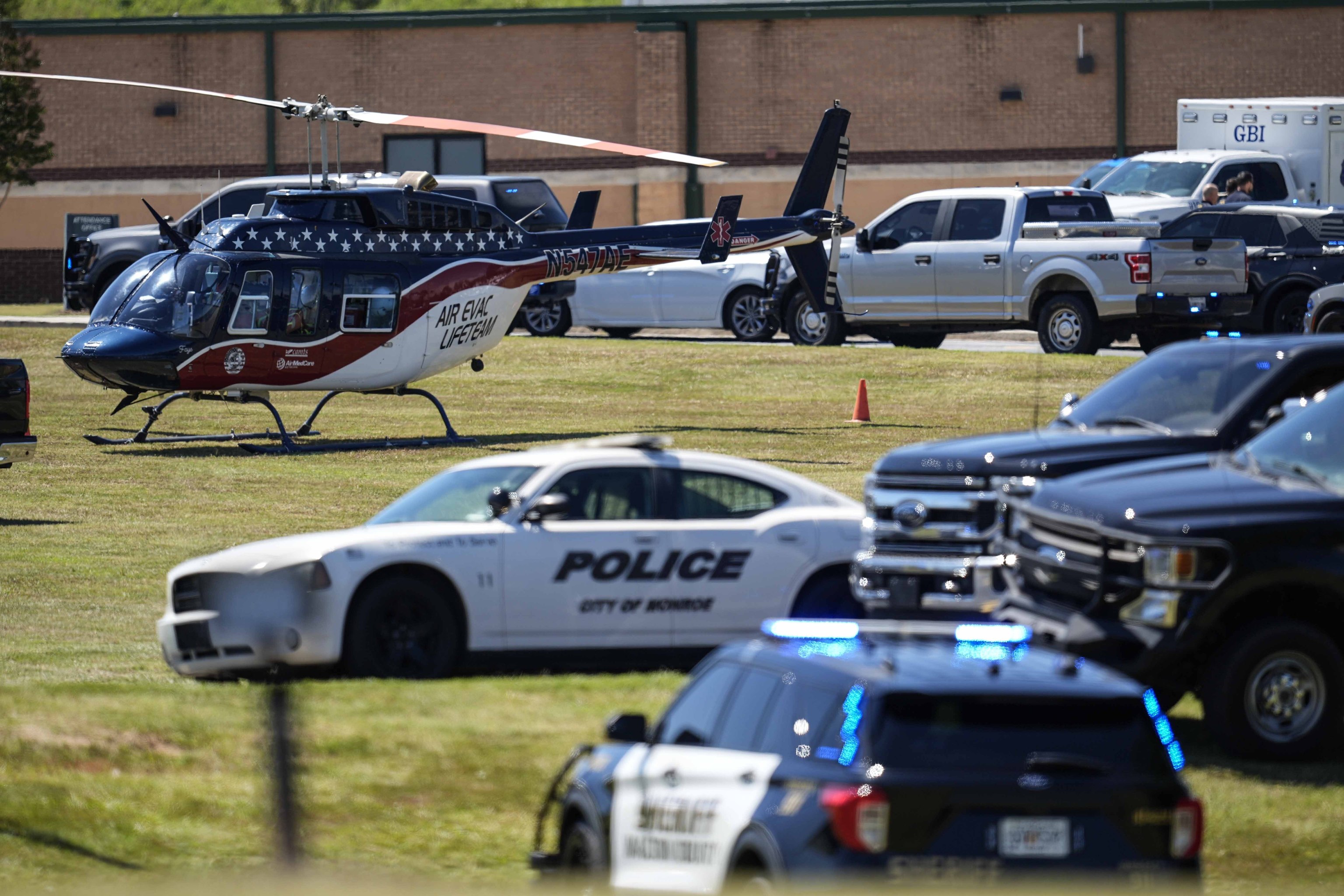 A medical helicopter is seen in front of Apalachee High School after a shooting.