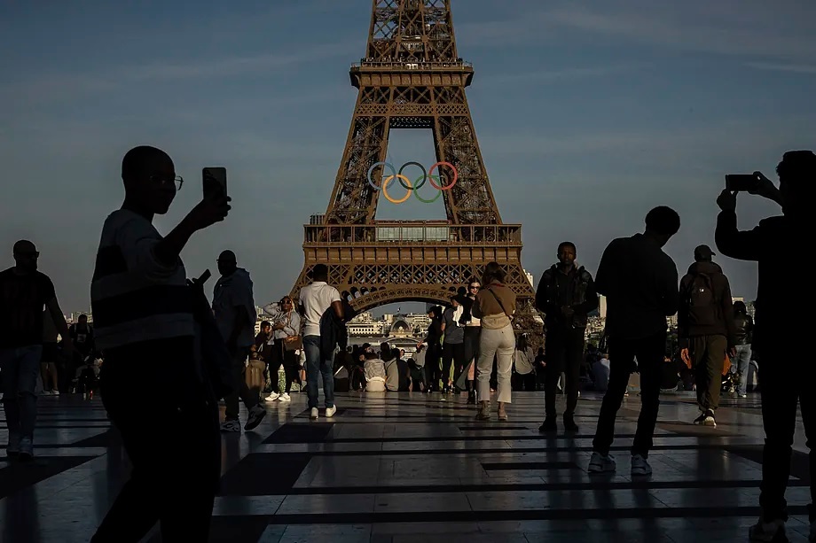 The Olympic rings on the Eiffel Tower.