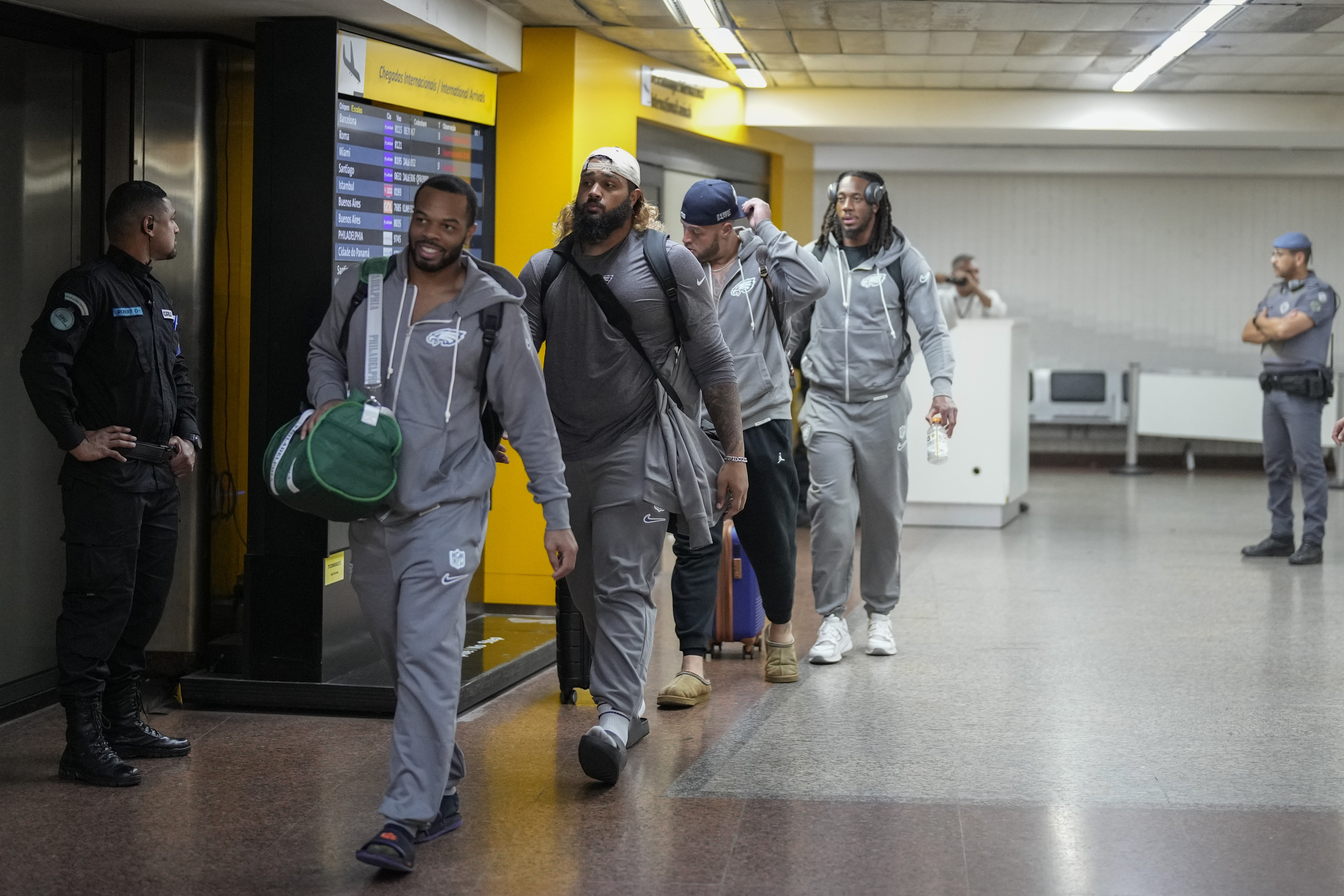 Philadelphia Eagles players arrive at Sao Paulo International airport.