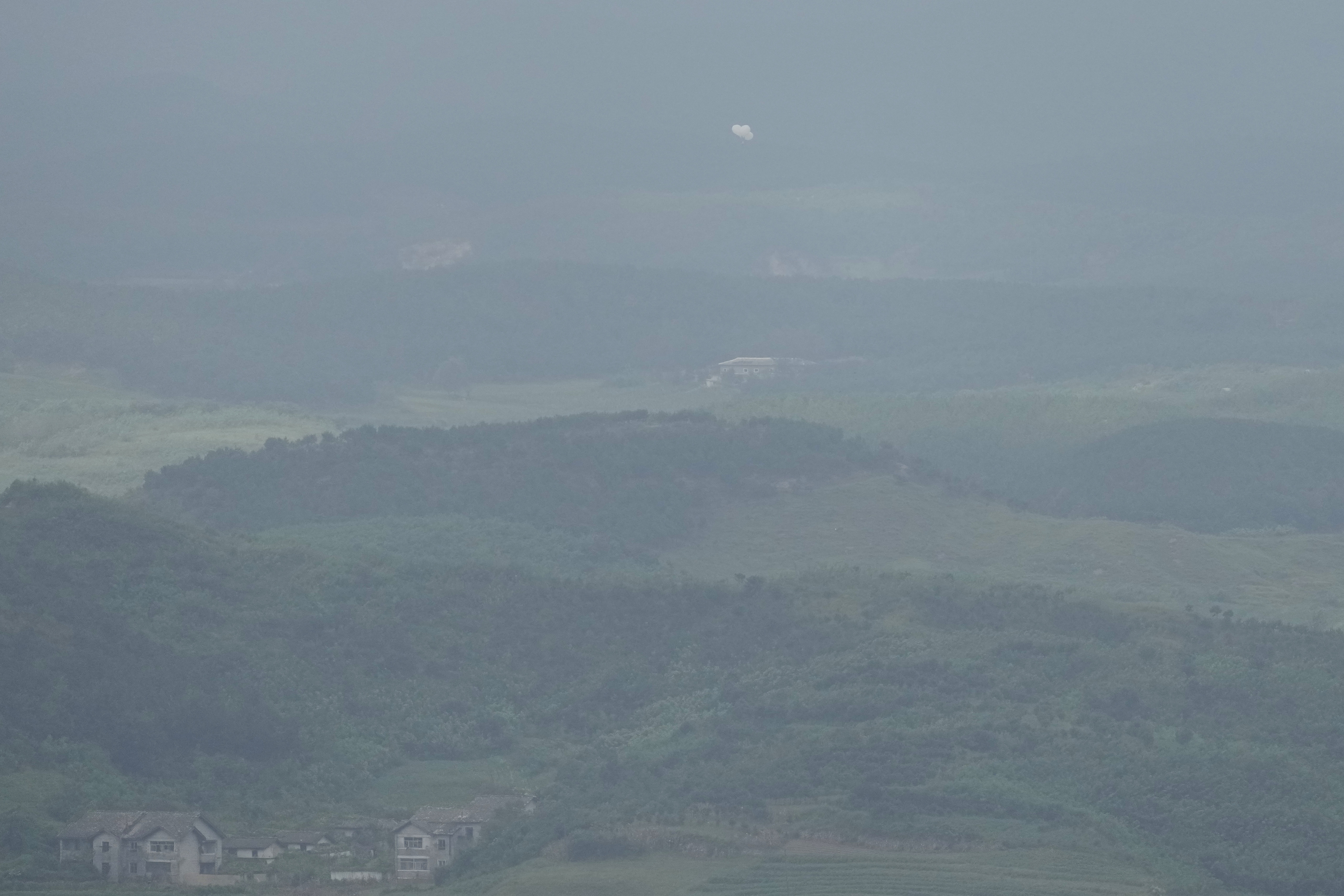 Balloons are seen from the Unification Observation Post in Paju, South Korea, near the border with North Korea