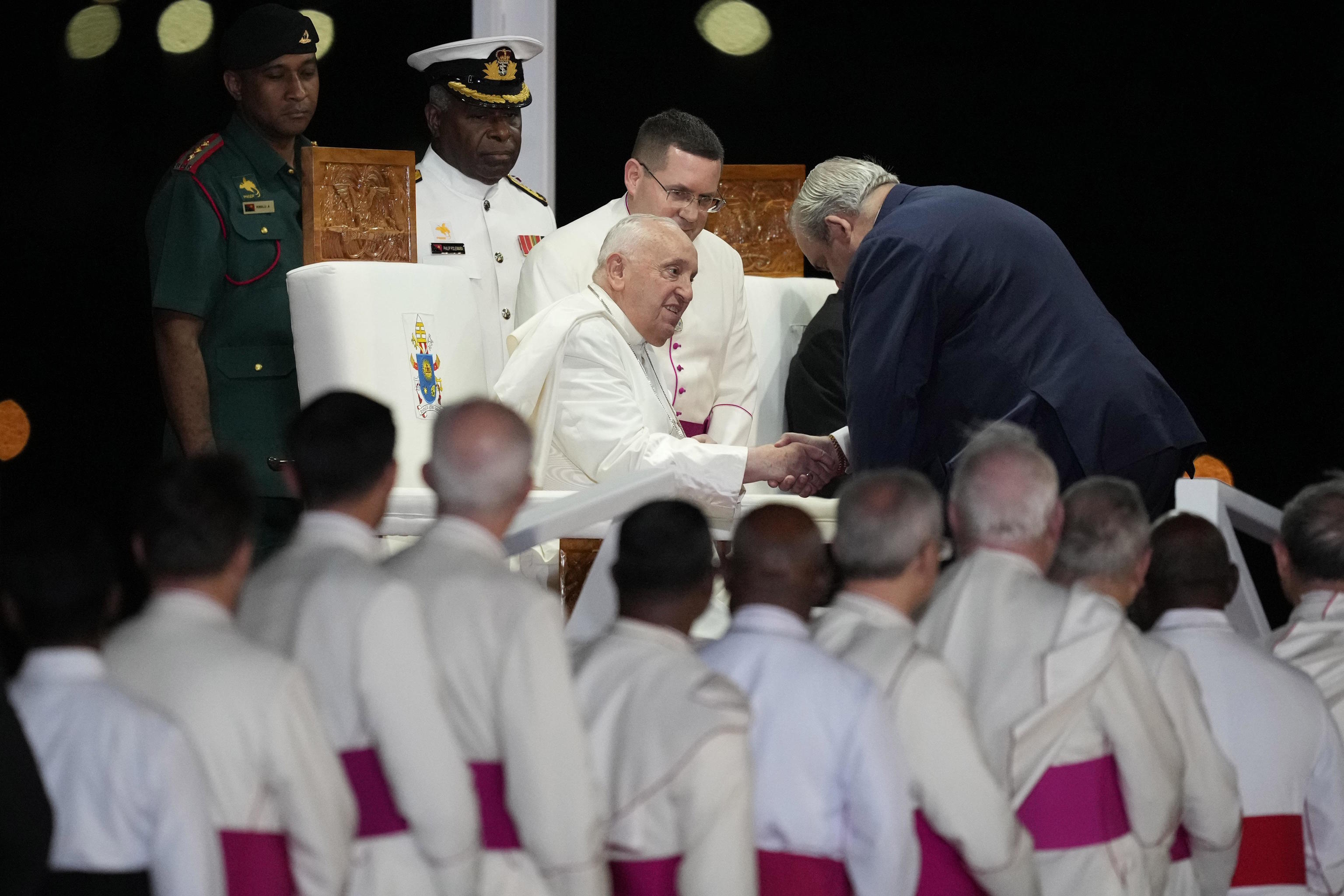 Tkatchenko greets Pope Francis.