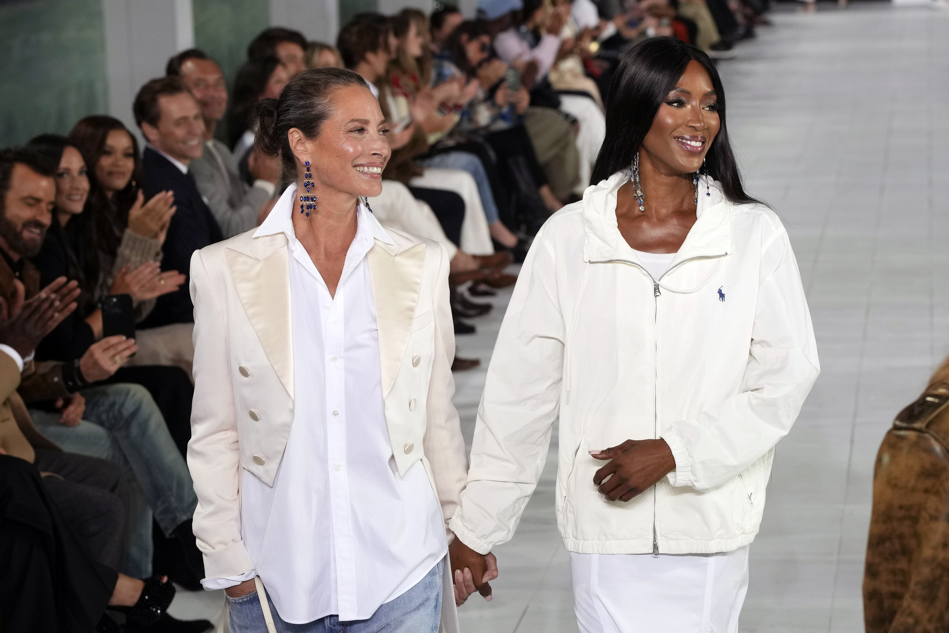 Christy Turlington, left, and Naomi Campbell walk the runway during the Ralph Lauren Spring/Summer 2025 fashion show