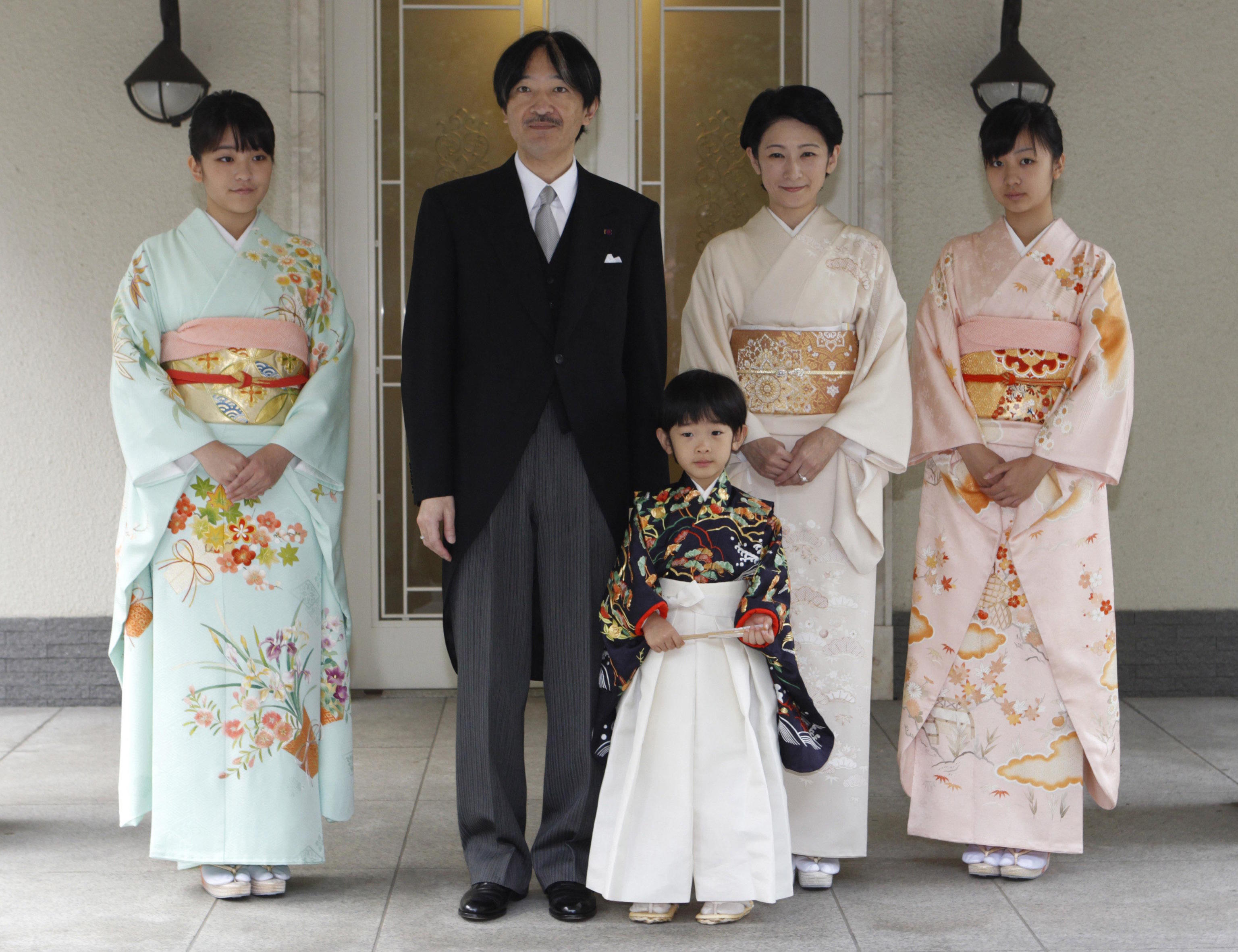 Japan's Prince Hisahito is accompanied by his parents in 2011.