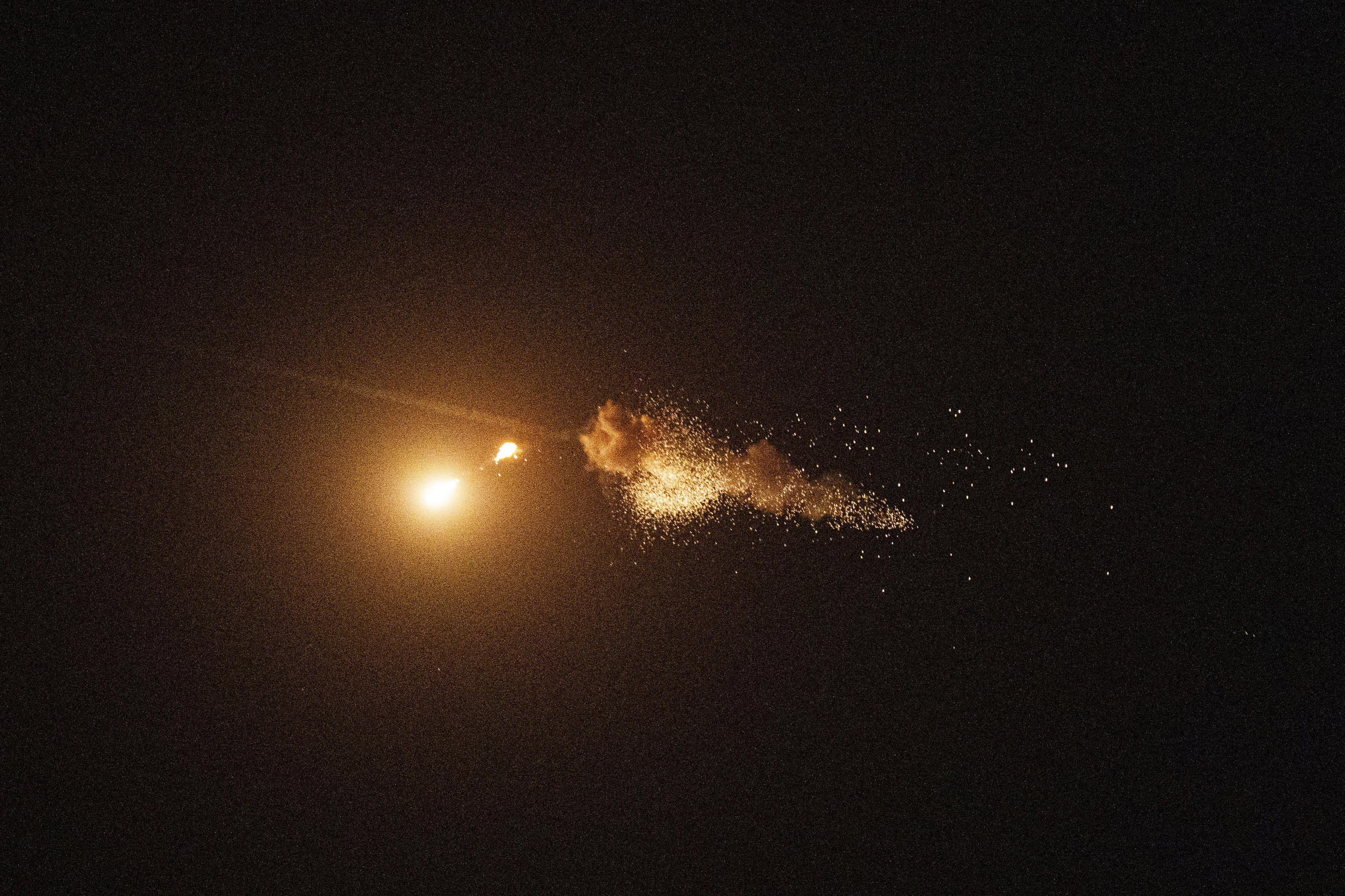 Anti-aircraft defenses shoot down a missile over Kiev.