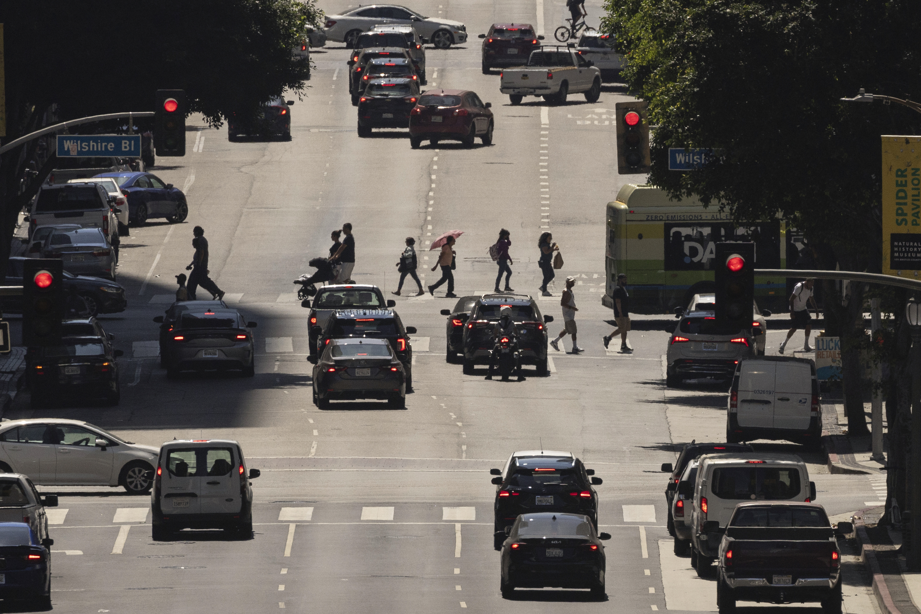 A pedestrian crosses a street