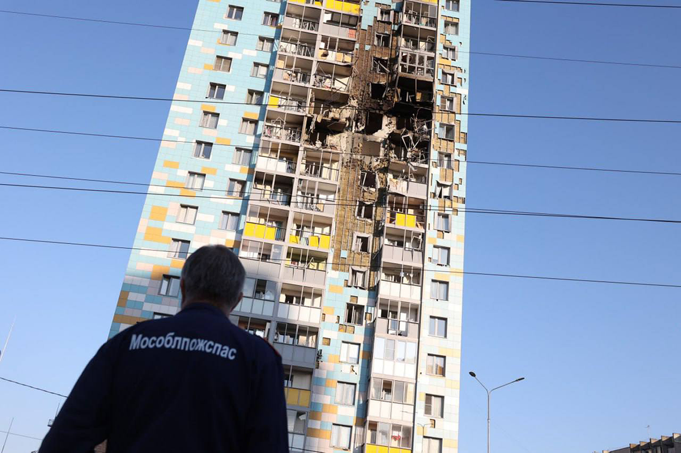 The site of the damaged multi-storey residential building following an alleged Ukrainian drone attack in Ramenskoye, outside Moscow,