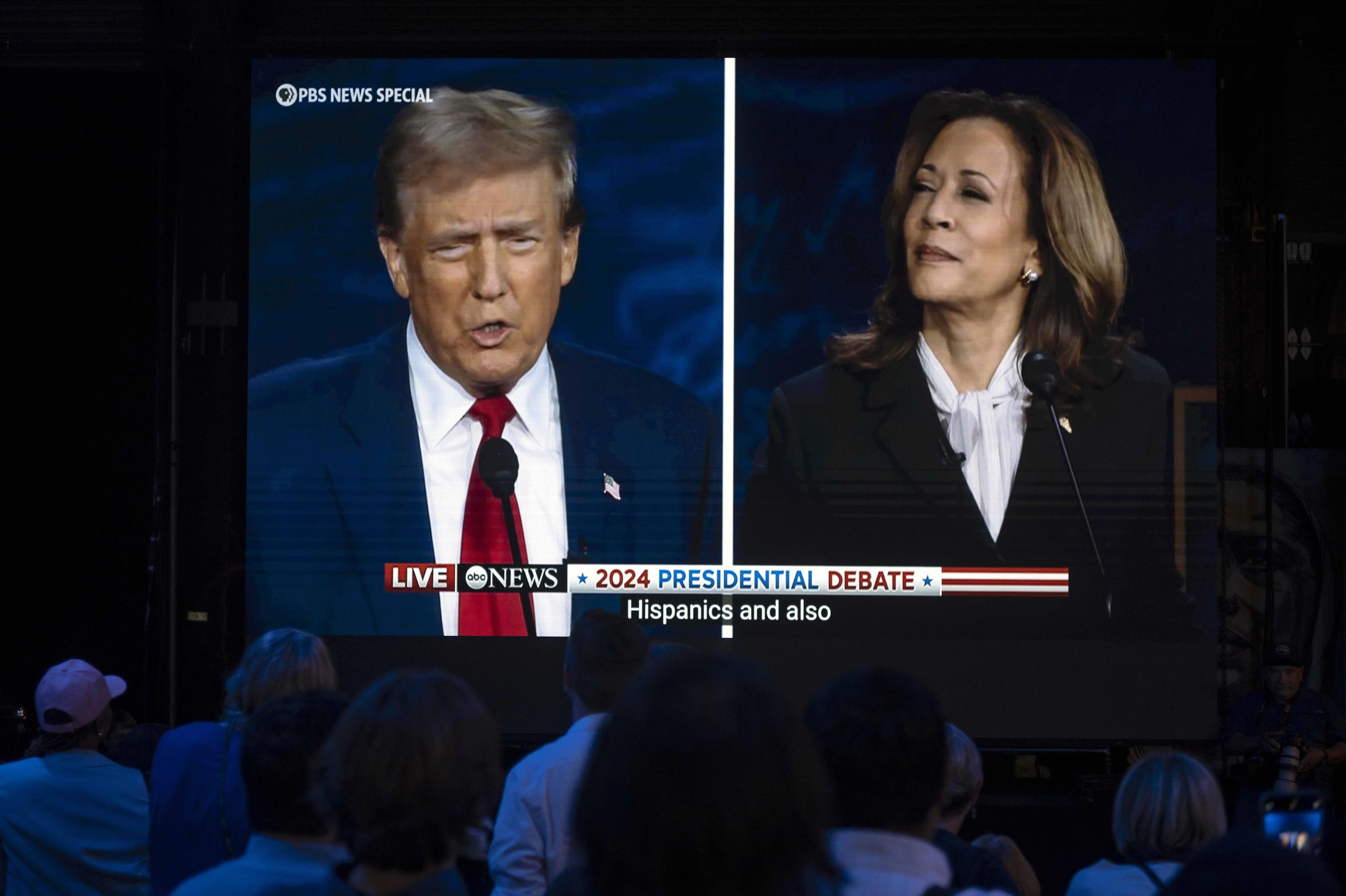 Donald Trump and Kamala Harris participate in a debate on ABC.