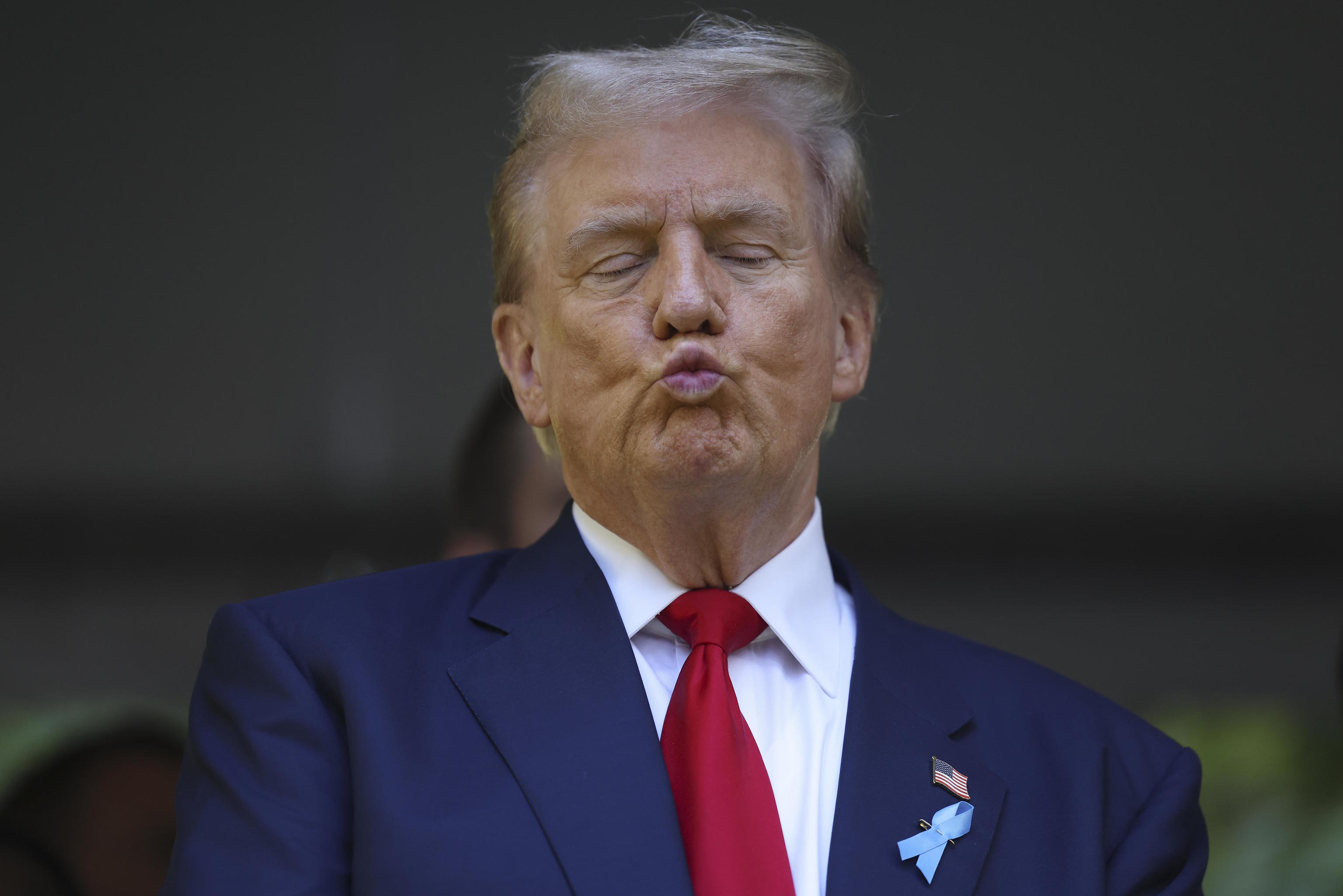 Trump reacts during the 9/11 Memorial ceremony.