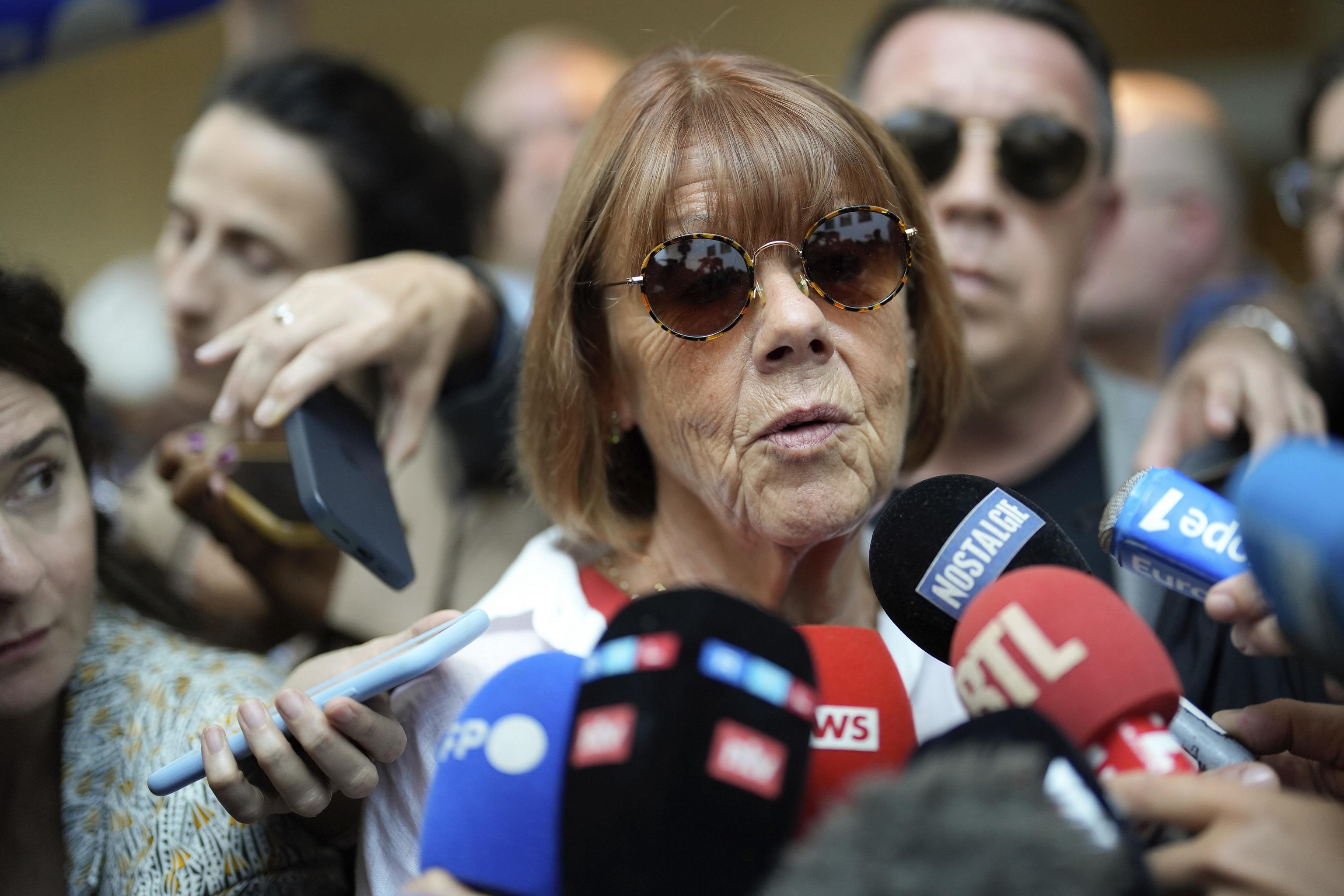 Gisele Pelicot speaks to media as she leaves the Avignon court house.