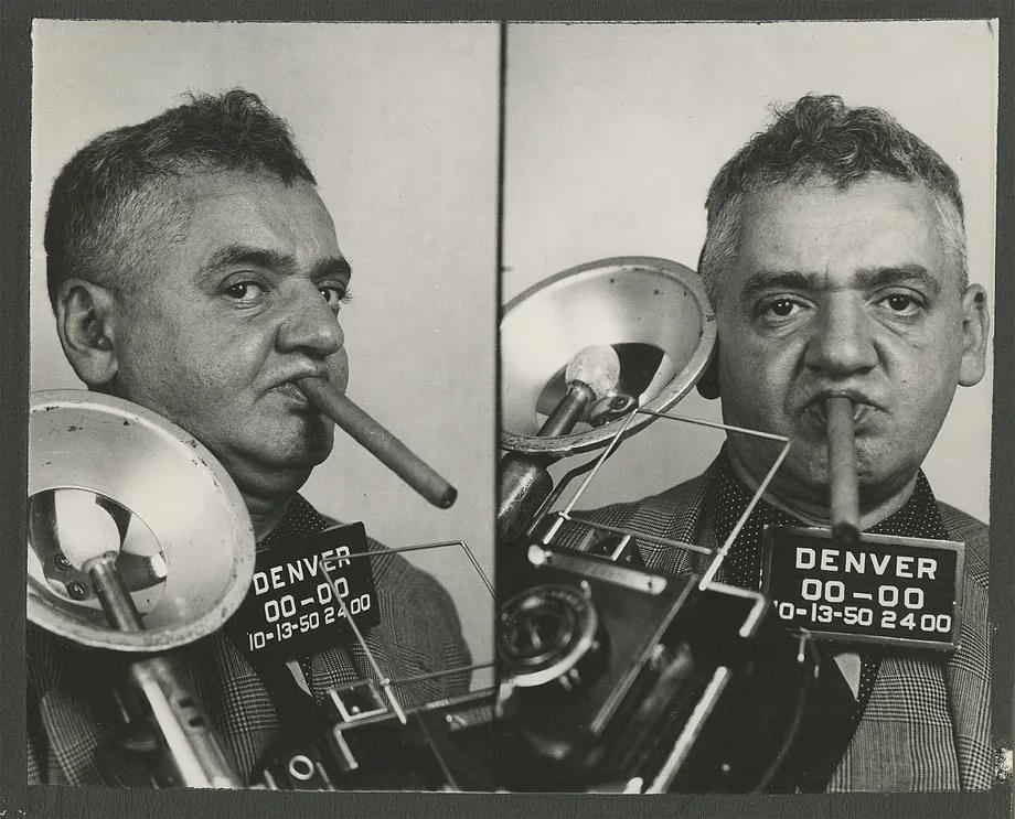 Self-portrait of the American photographer Weegee.