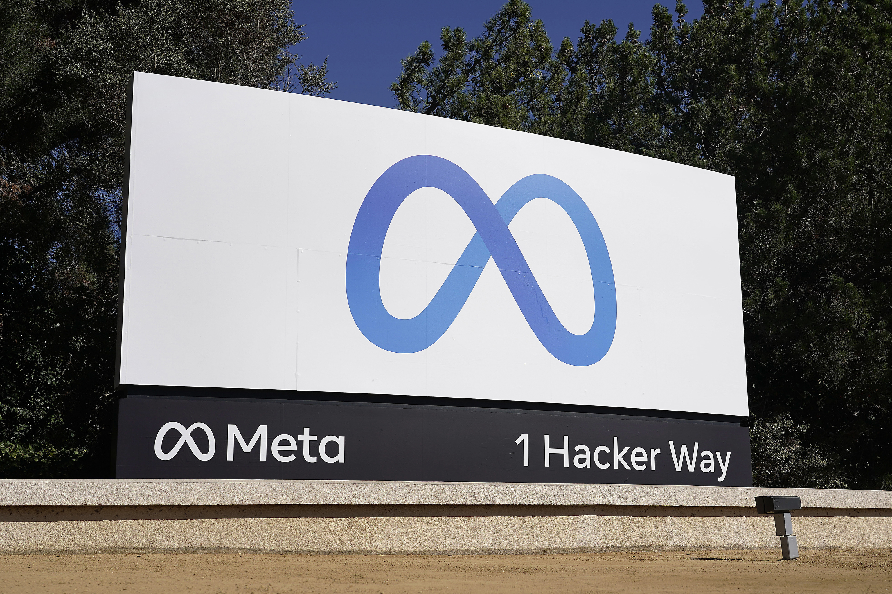 Facebook's Meta logo sign is seen at the company headquarters in Menlo Park