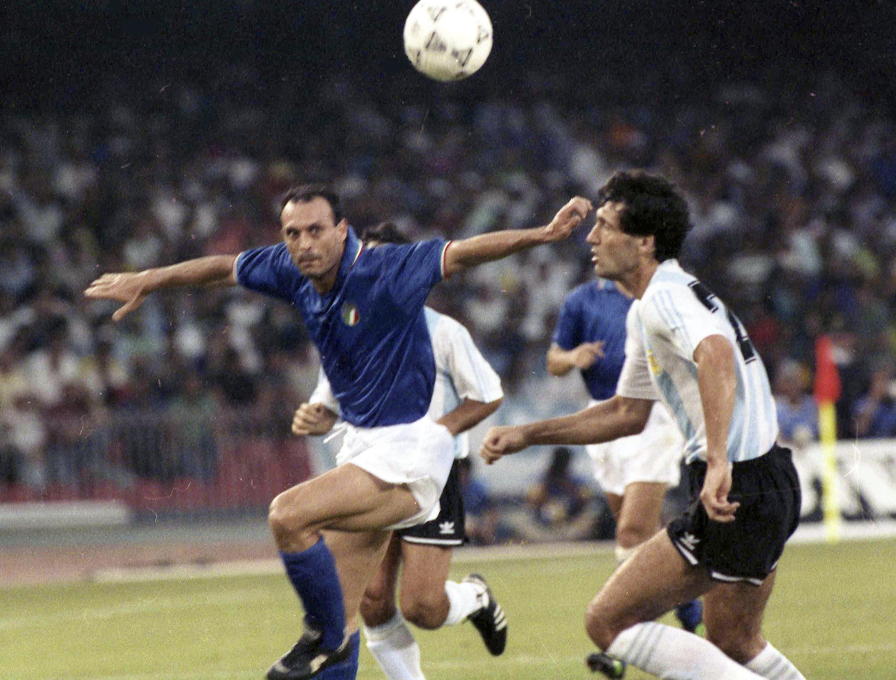 Italy's Salvatore "Tot" Schillaci, left.