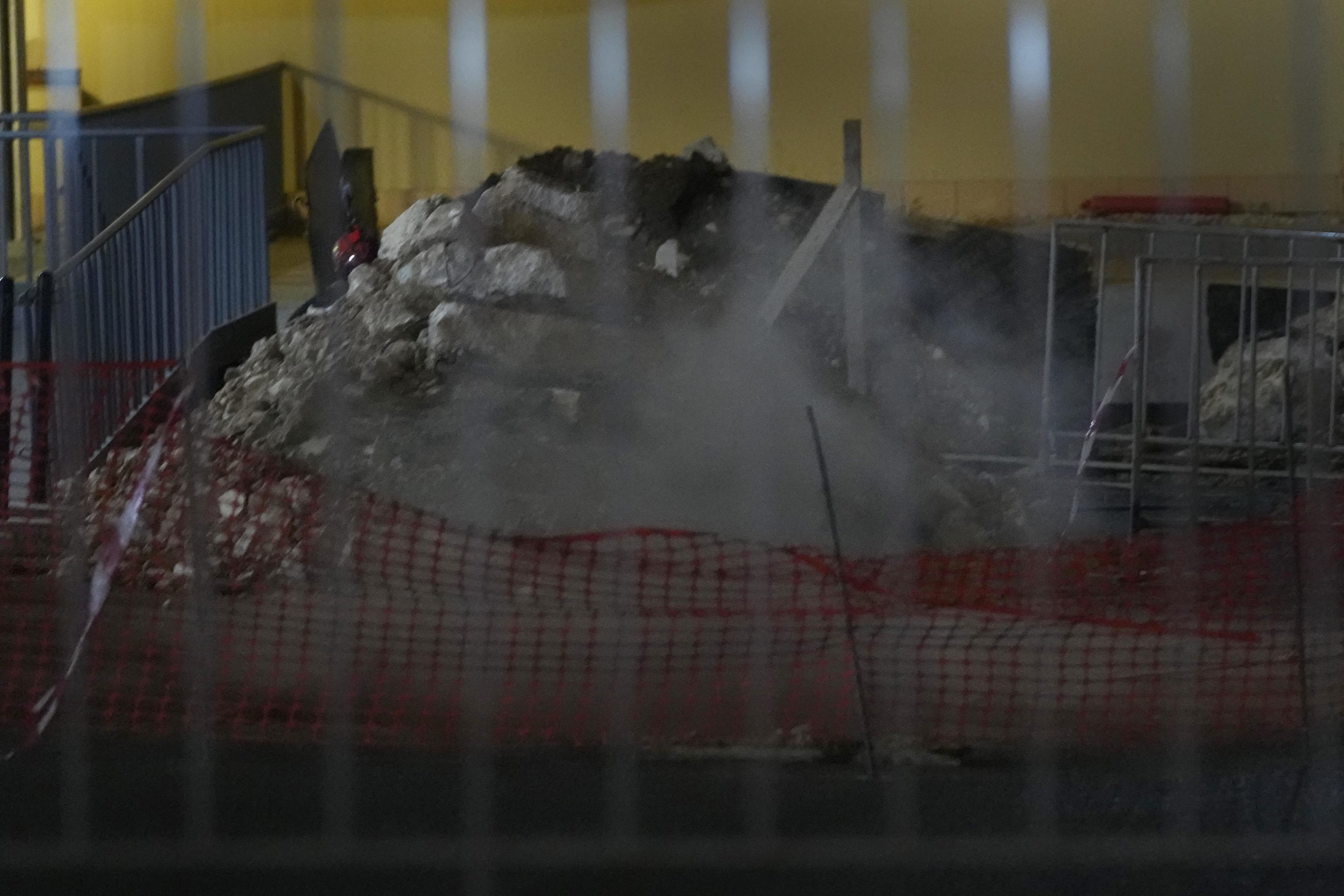 Smoke rises from a crater after the Lebanese army detonate a walkie-talkie.