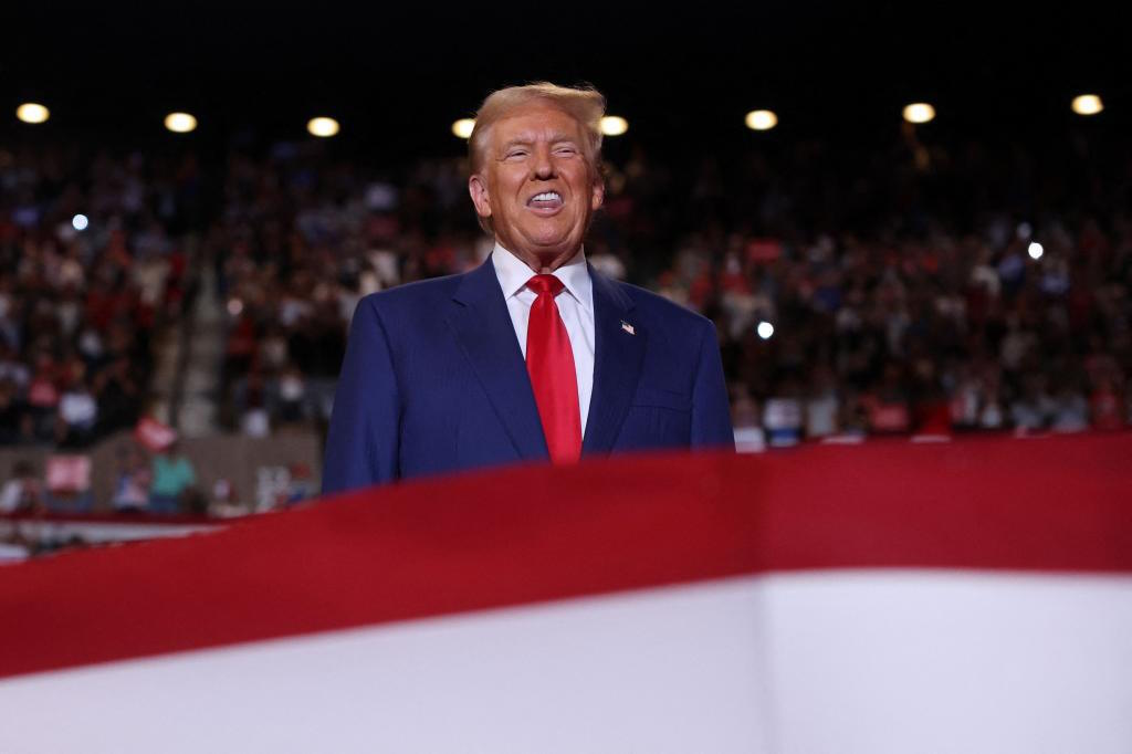 Donald Trump speaks at an evening rally in Uniondale on Long Island.