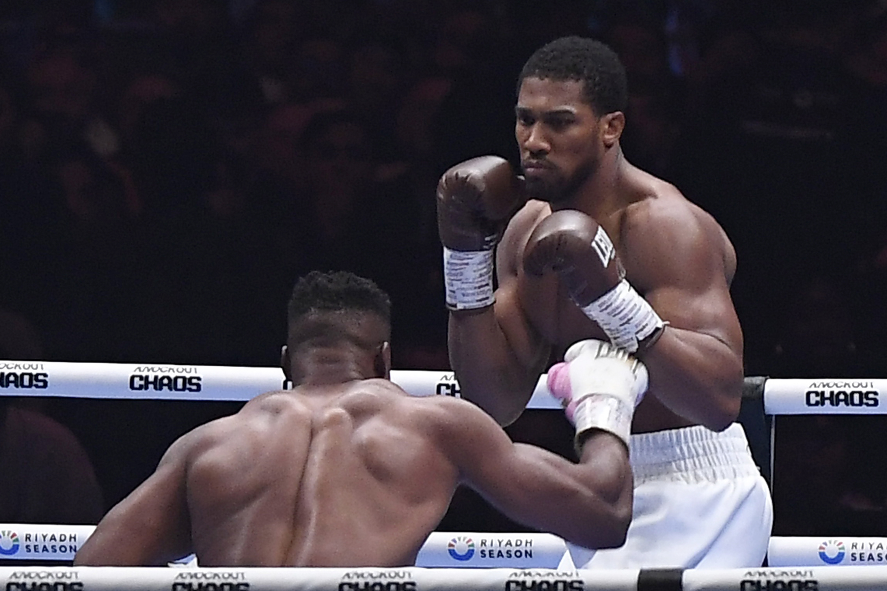 British former world champion Anthony Joshua, right, and MMA fighter Francis Ngannou