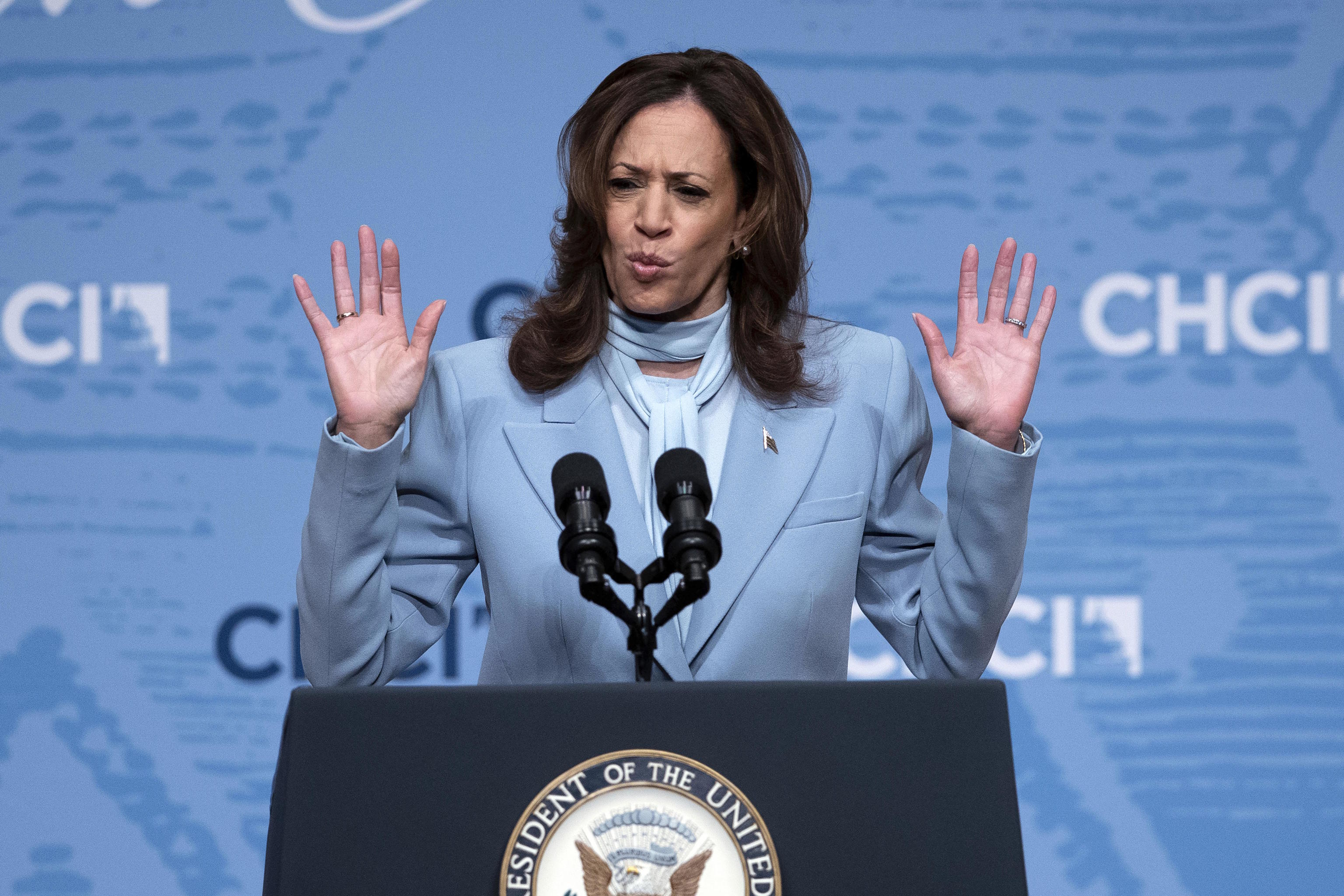 Harris waves at the Congressional Hispanic Caucus Institute in Washington.