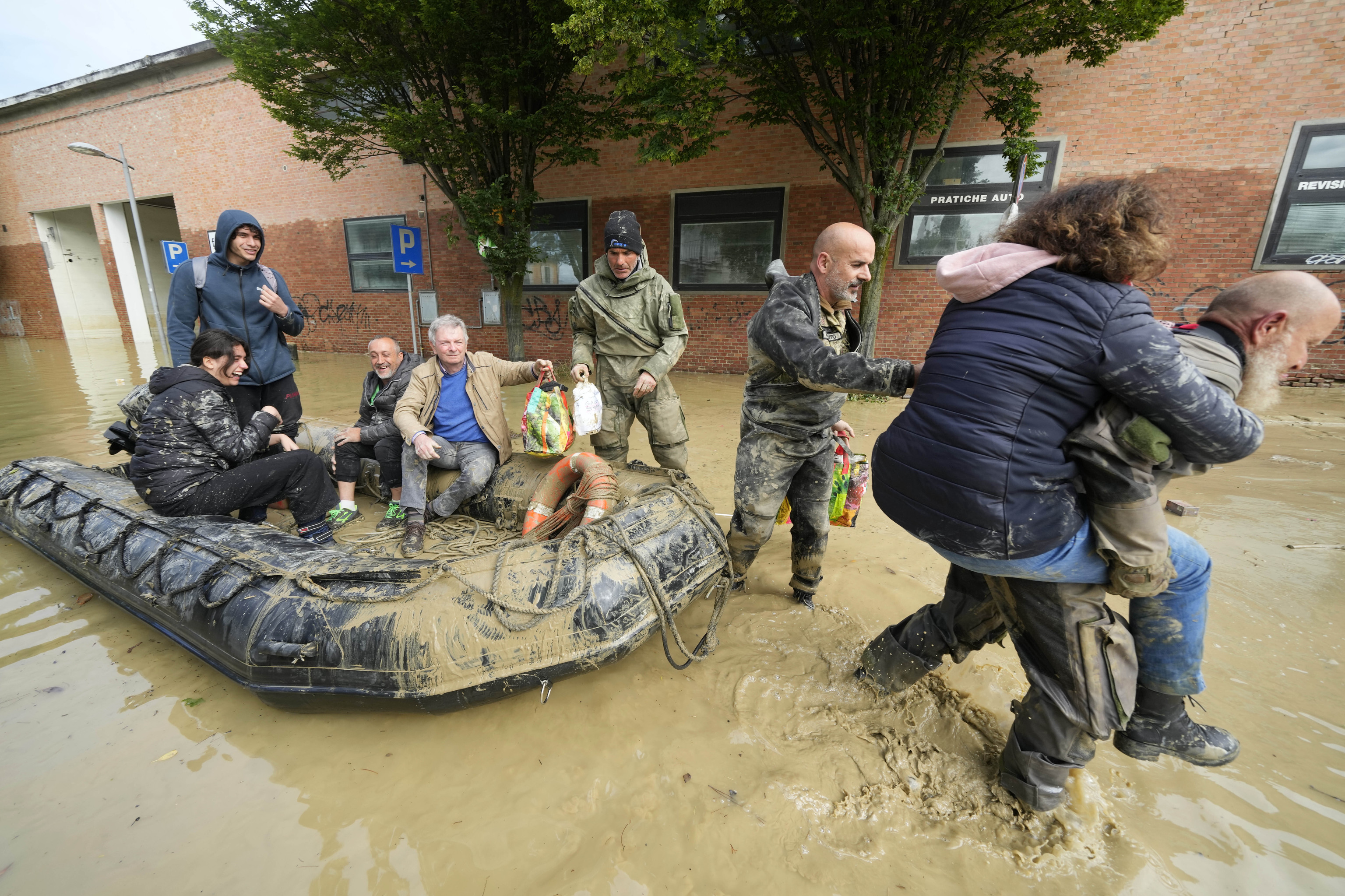 People are rescued in Faenza, Italy.