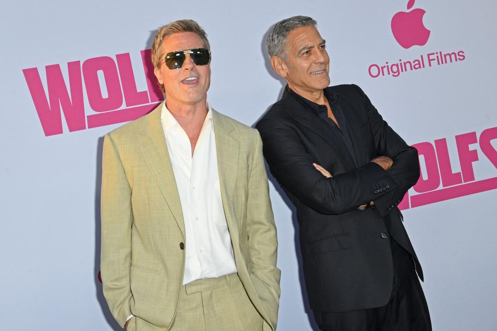 US actor Brad Pitt (L) and US actor George Clooney.