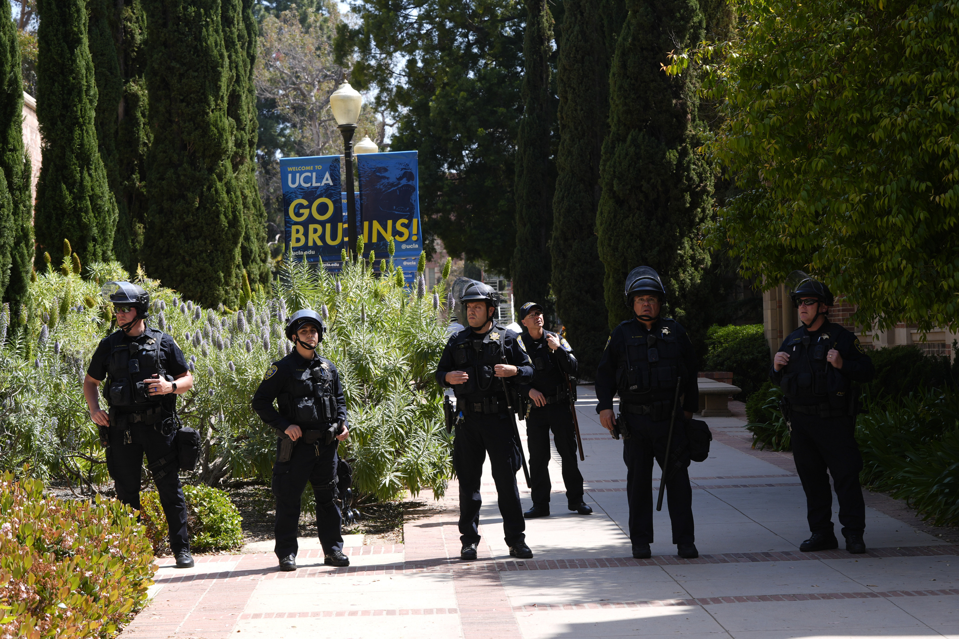 Police stage on the UCLA campus after nighttime clashes between pro-Israel and pro-Palestinian groups