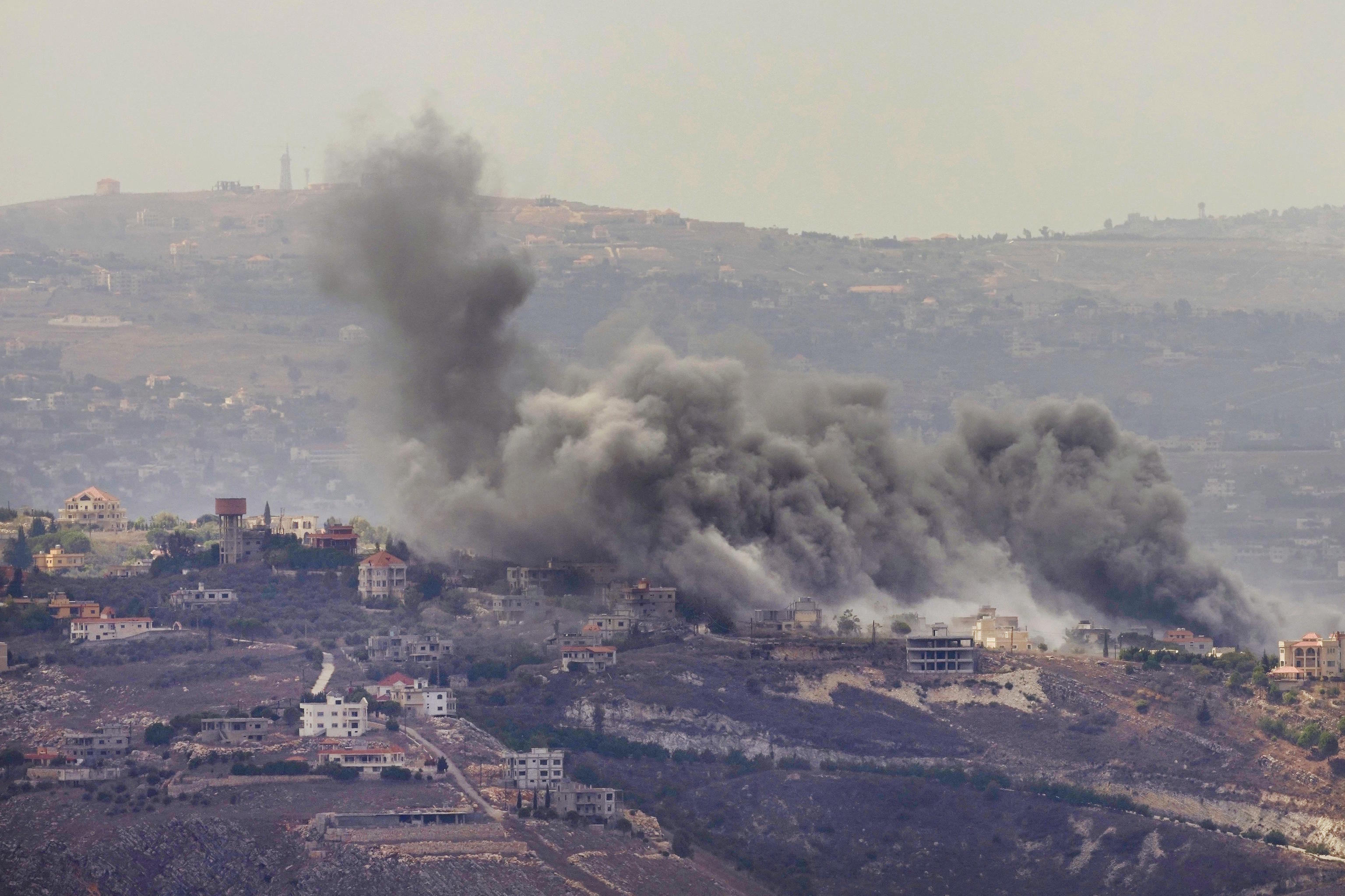 Smoke rises from Israeli airstrikes on villages in the Nabatiyeh district.