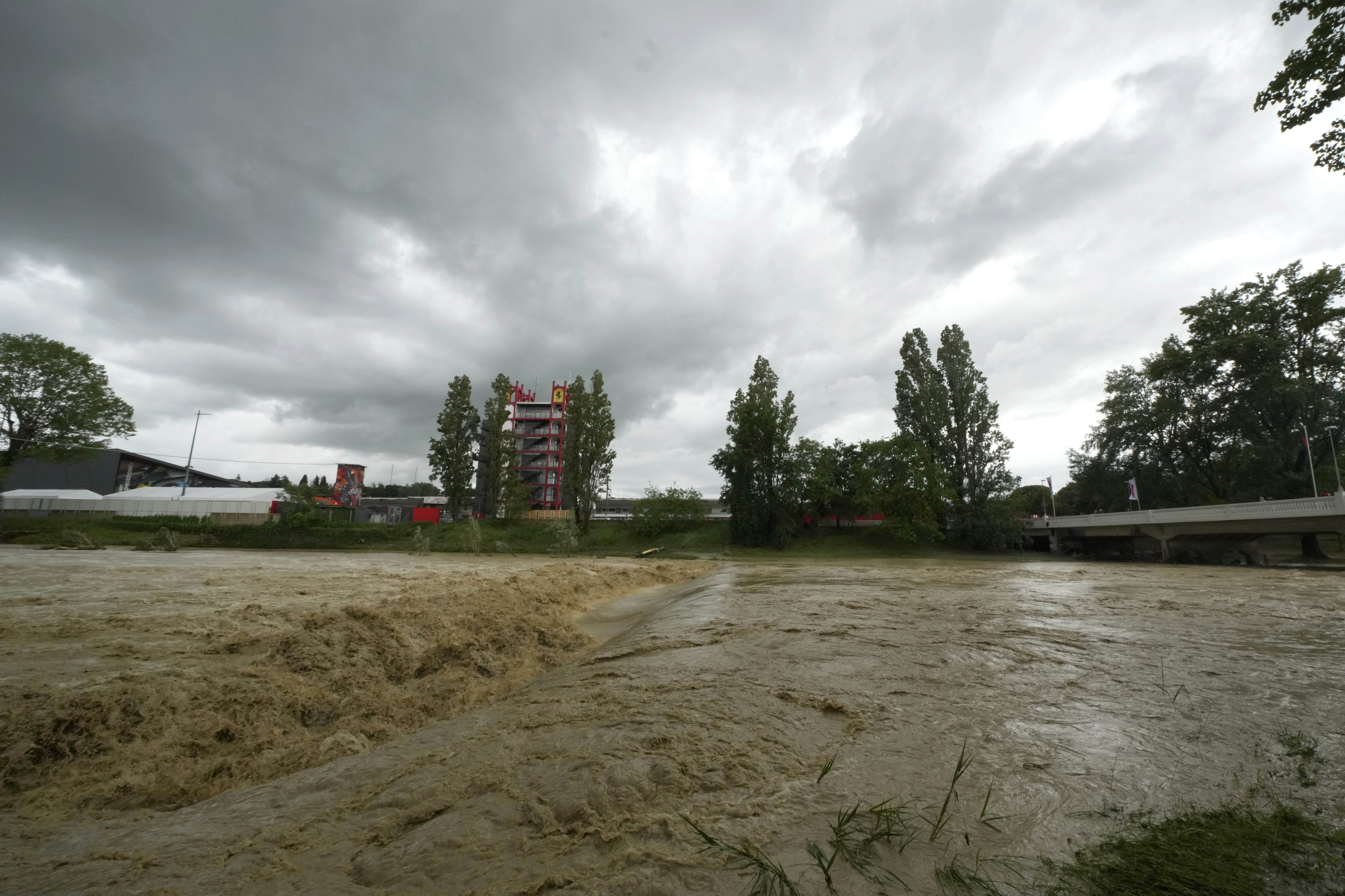 A view of the swollen Santerno River with behind the Enzo e Dino Ferrari circuit